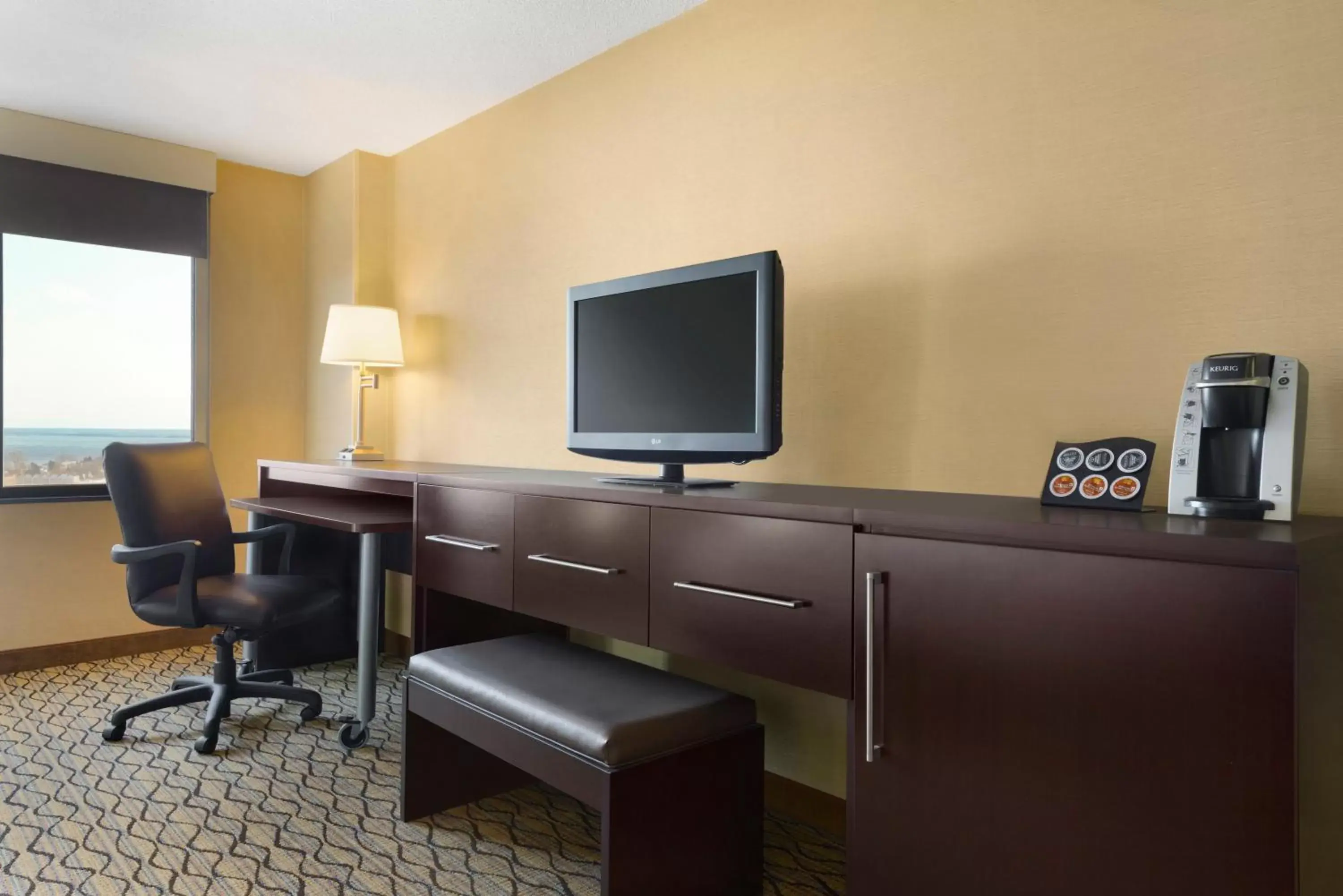 Photo of the whole room, TV/Entertainment Center in Holiday Inn & Suites Duluth-Downtown, an IHG Hotel