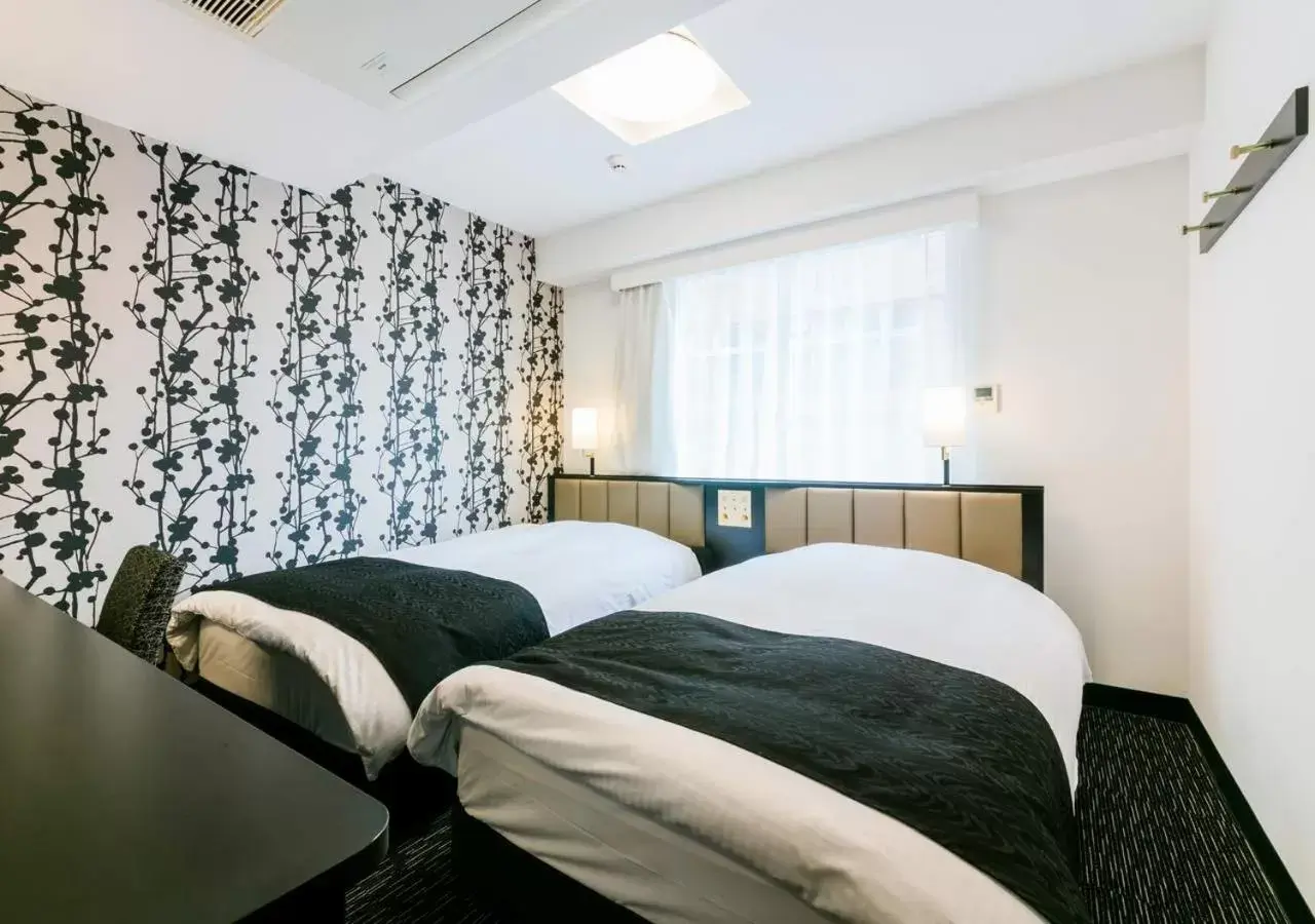 Photo of the whole room, Bed in APA Hotel Nagasaki Ekimae