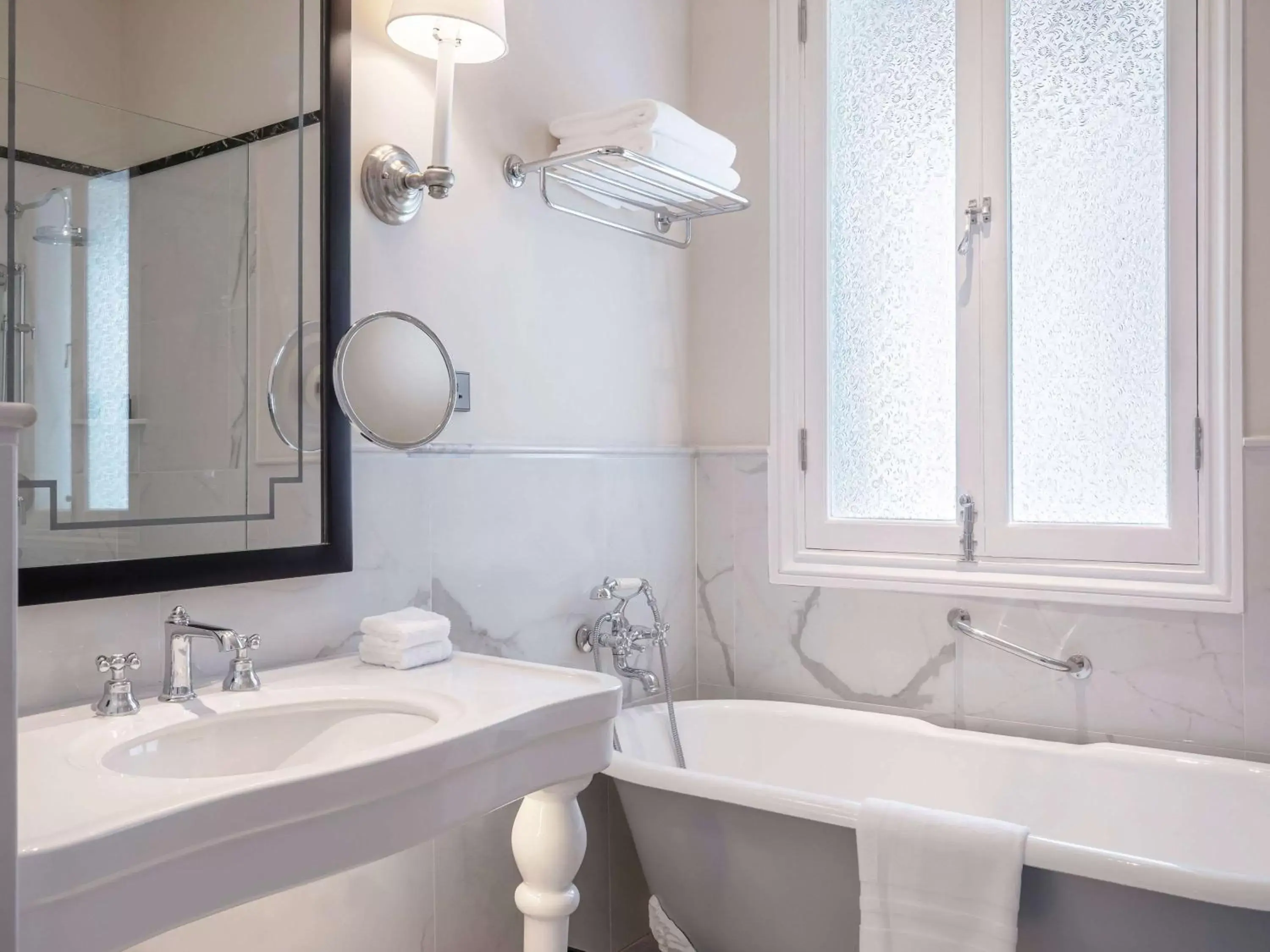 Photo of the whole room, Bathroom in Raffles Hotel Le Royal