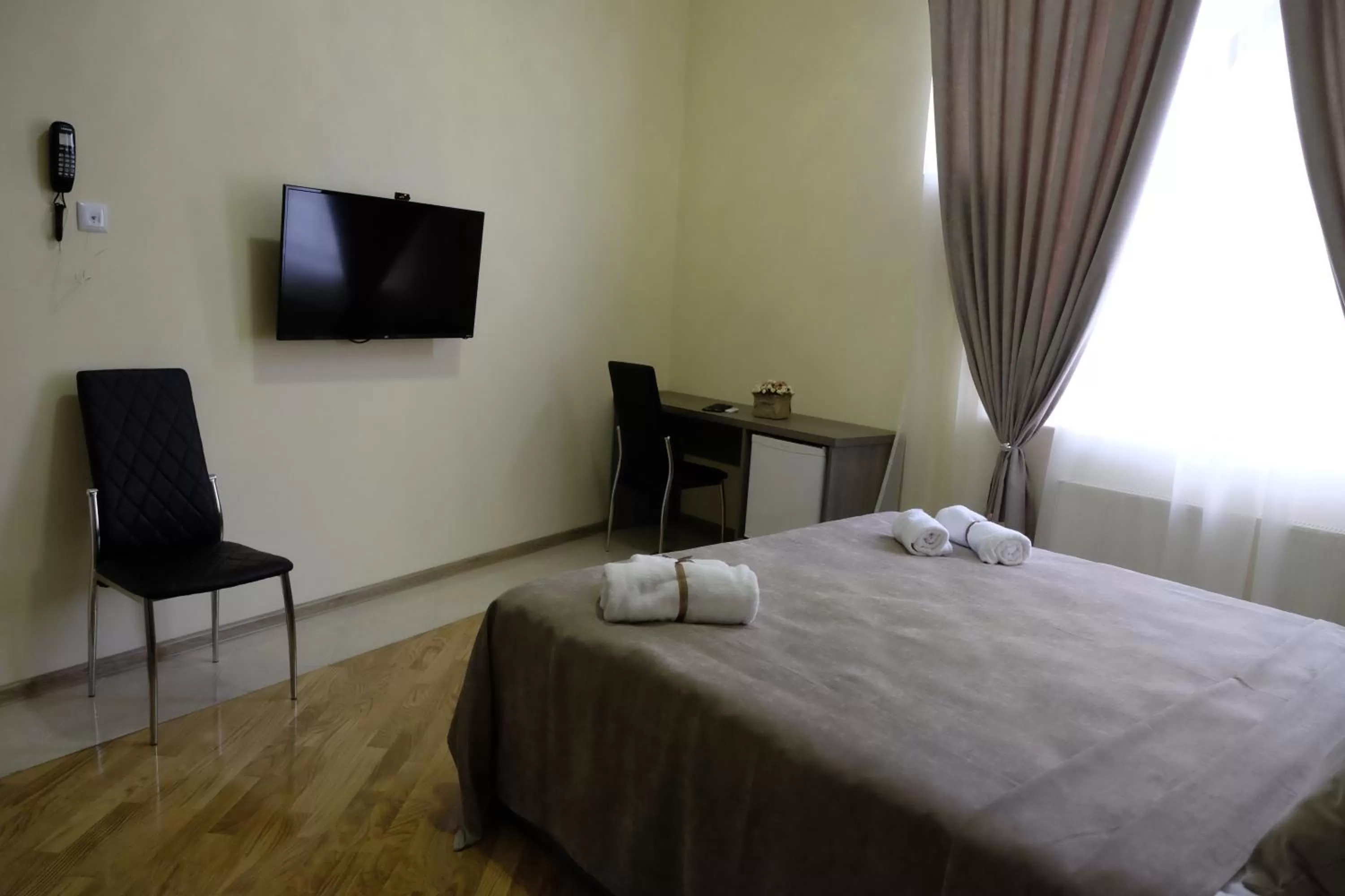 Bed in S&L Boutique Hotel