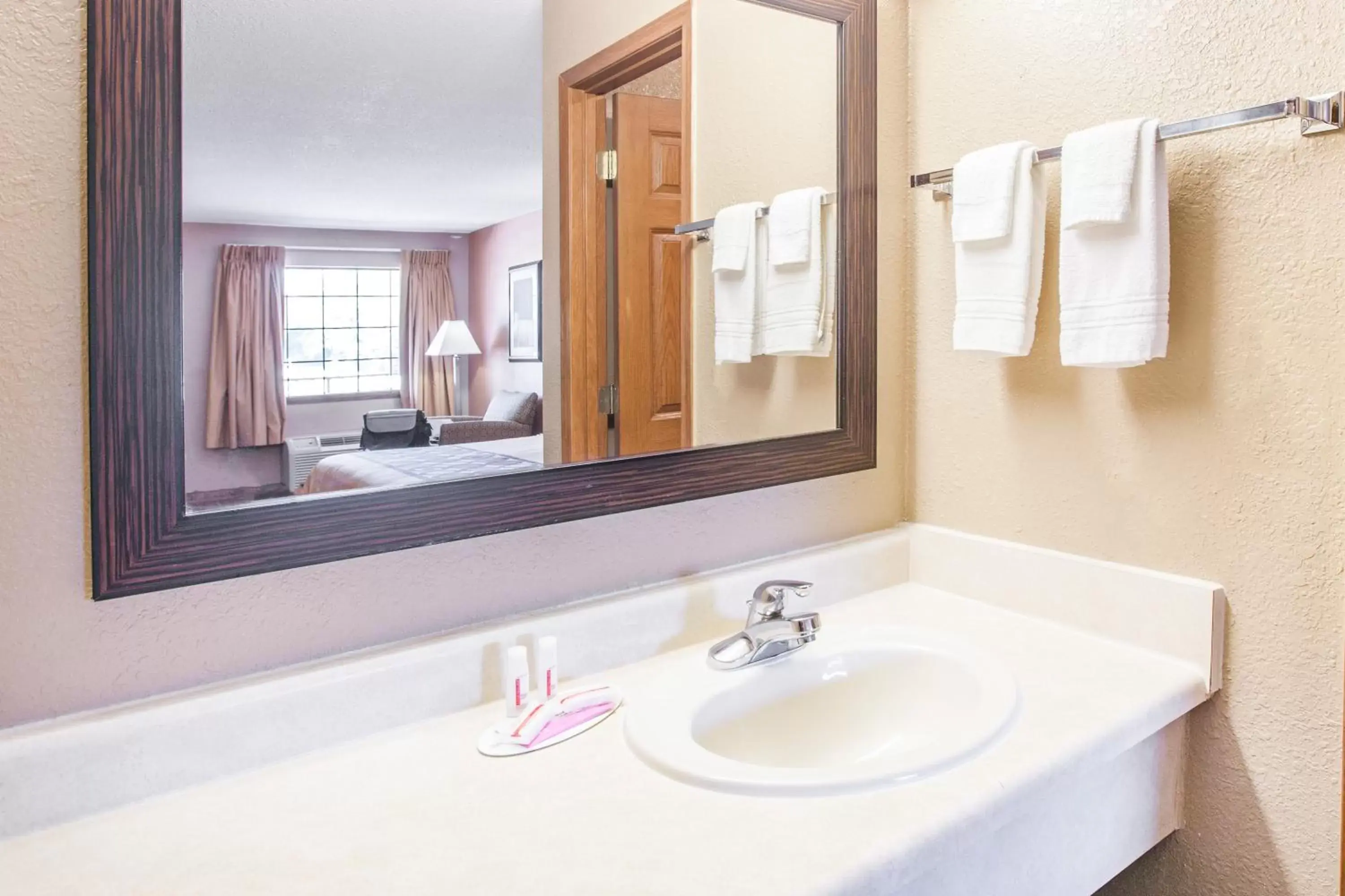 Bathroom in Super 8 by Wyndham Clinton