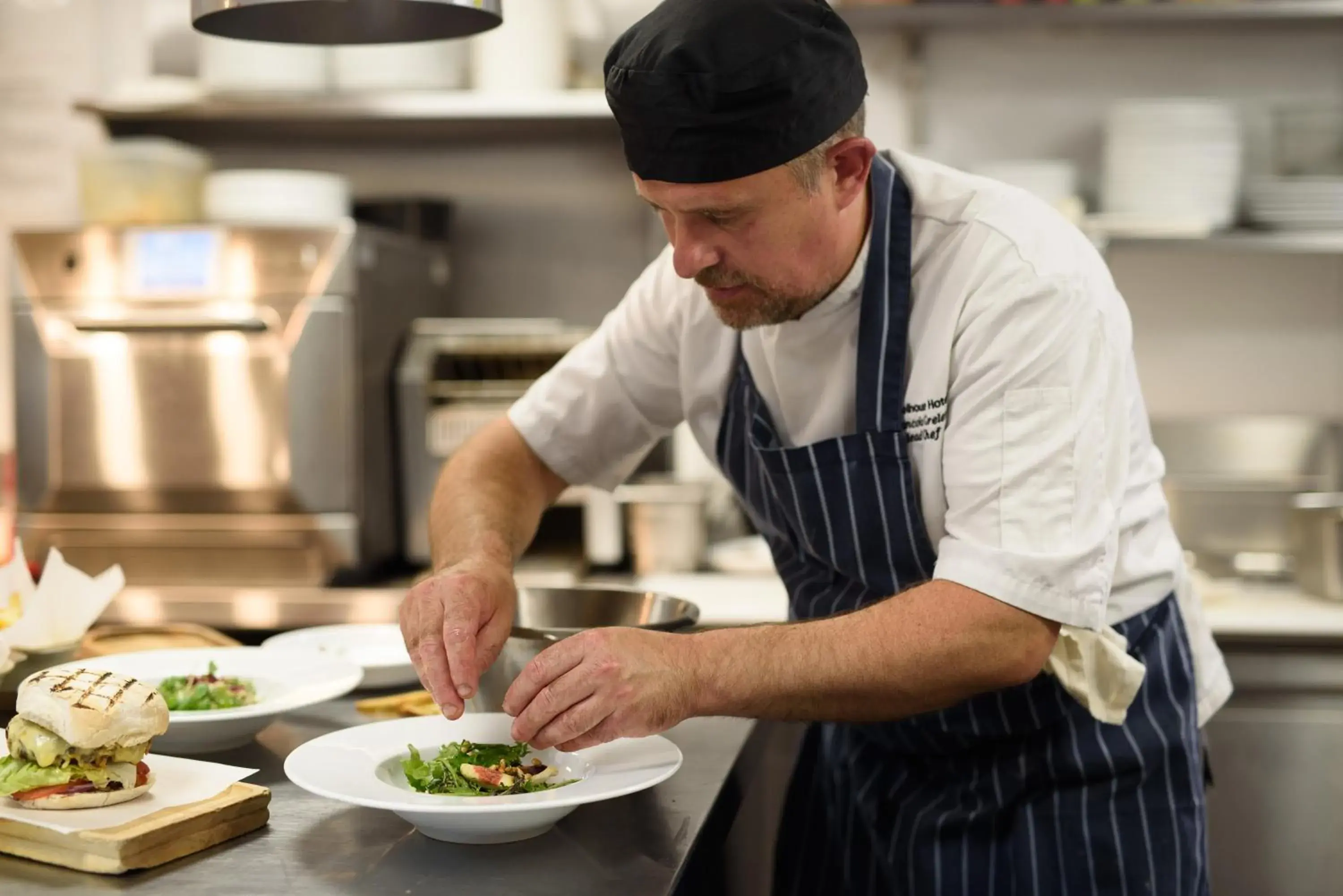 Kitchen or kitchenette, Staff in Schoolhouse Hotel