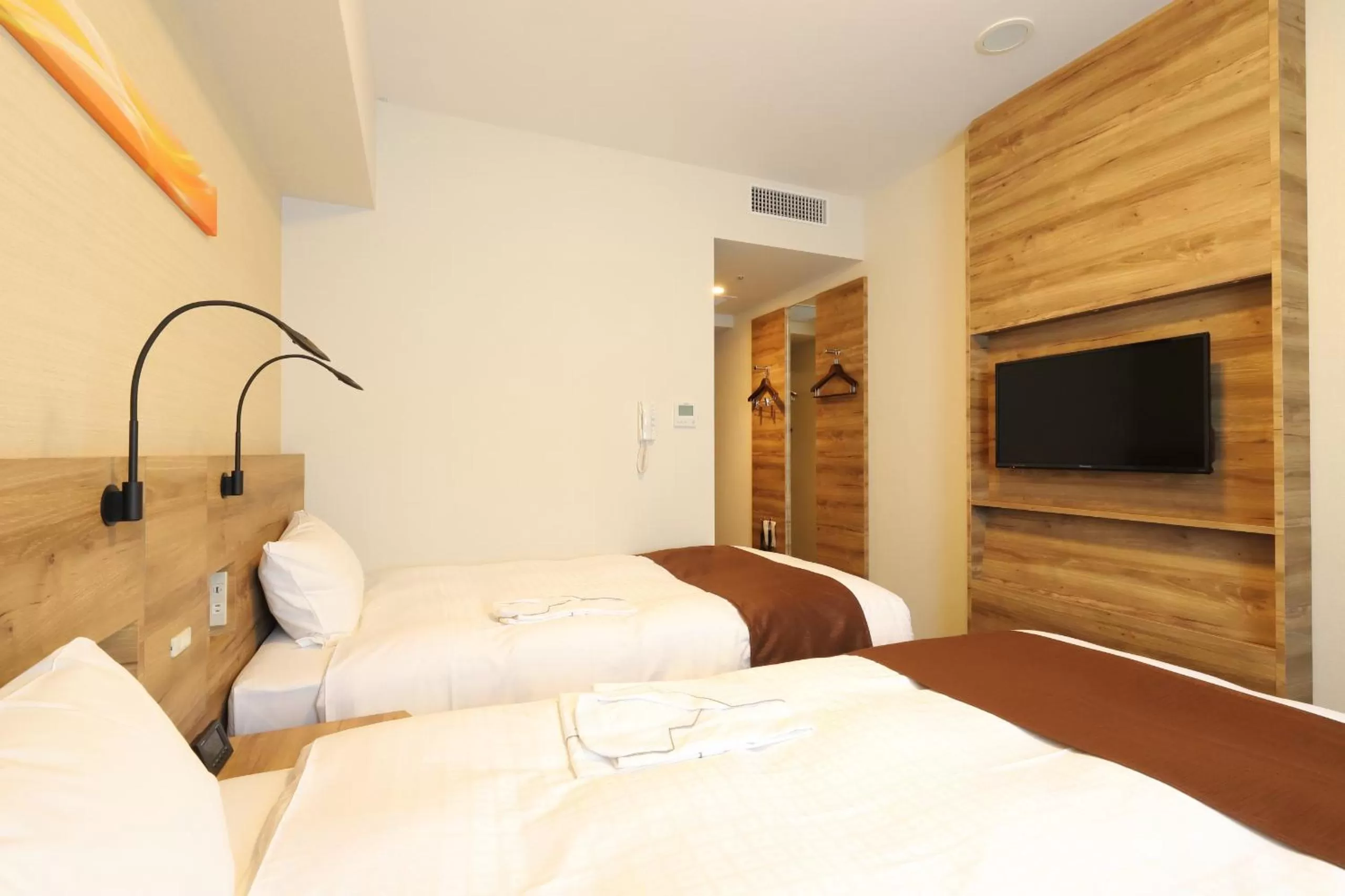 Bedroom, Bed in Smile Hotel Premium Osaka Higashishinsaibashi