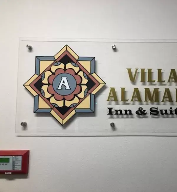 Property Logo/Sign in Villa Alamari Inn and Suites