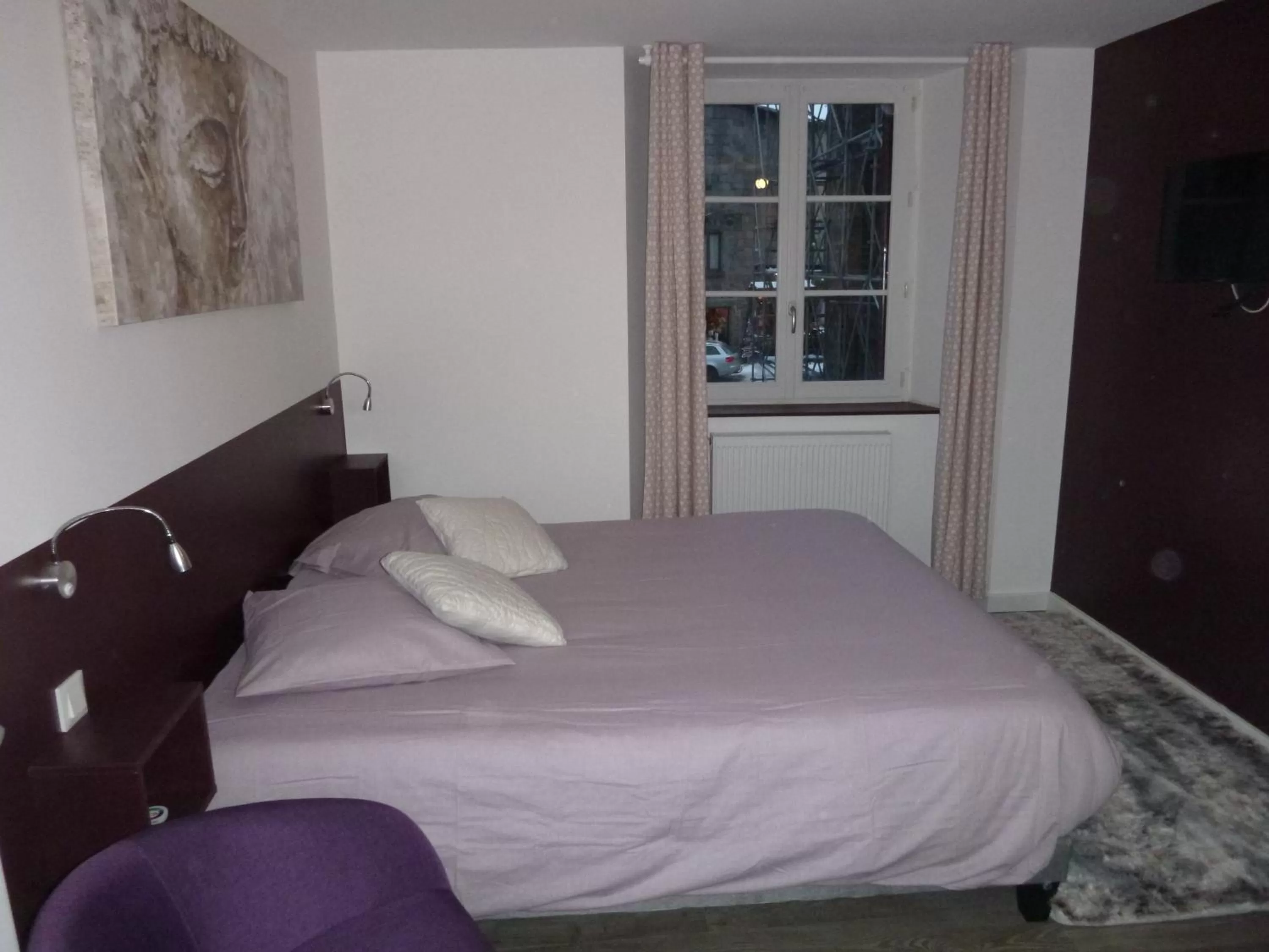 Bed in Le Bouddha Besse