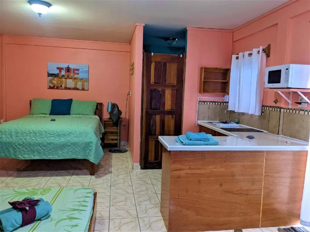 Bed in Beach Side Condos Caye Caulker by CCVH