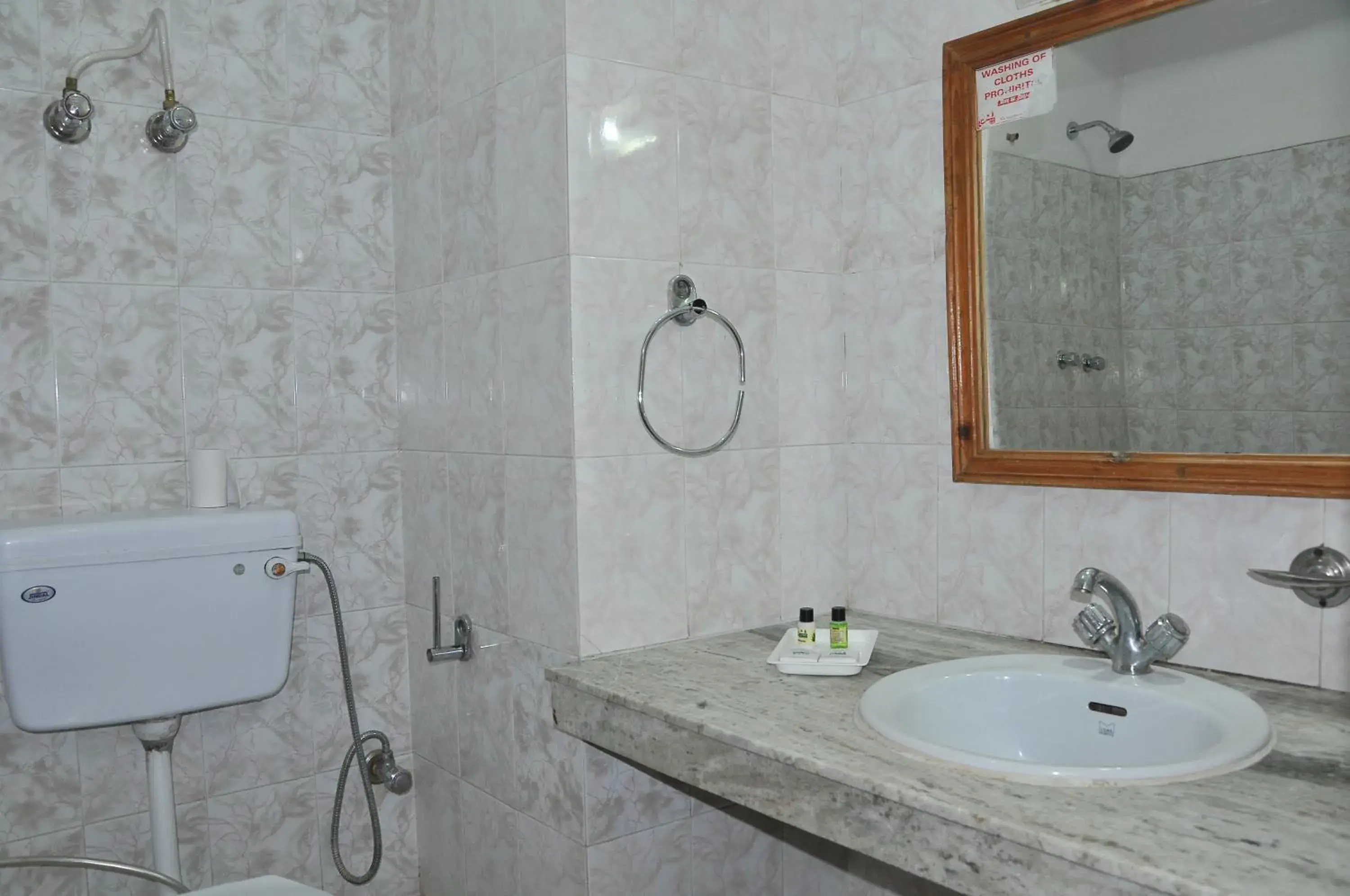 Bathroom in Sarthak Resorts-Reside in Nature with Best View, 9 kms from Mall Road Manali