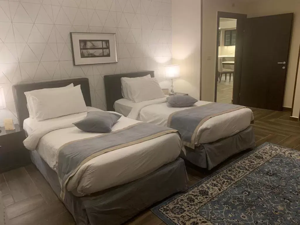 Bed in City Rose Hotel Suites Bed in City Rose Hotel Suites