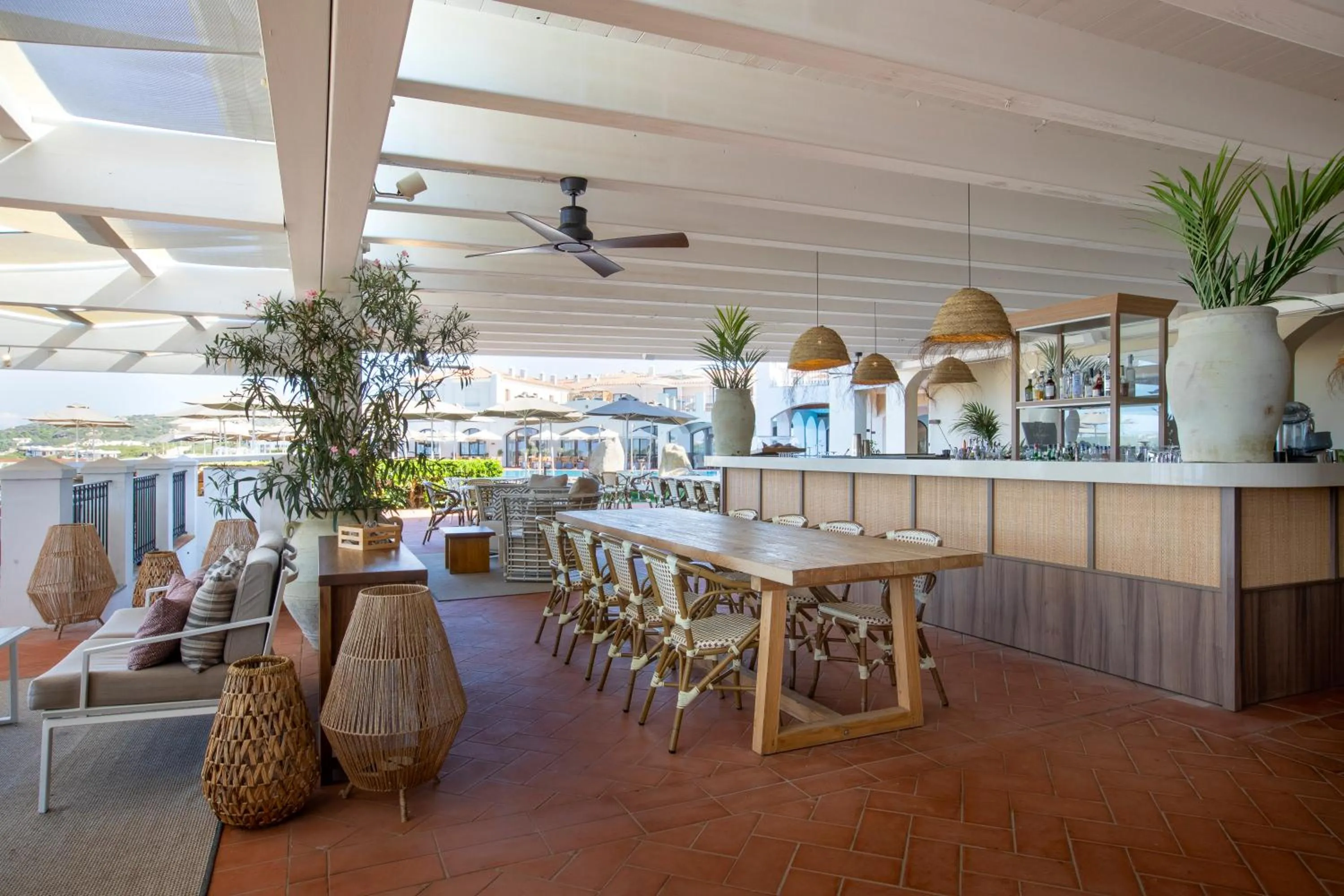 Lounge or bar in Mangia's Santa Teresa Sardinia, Curio Collection by Hilton