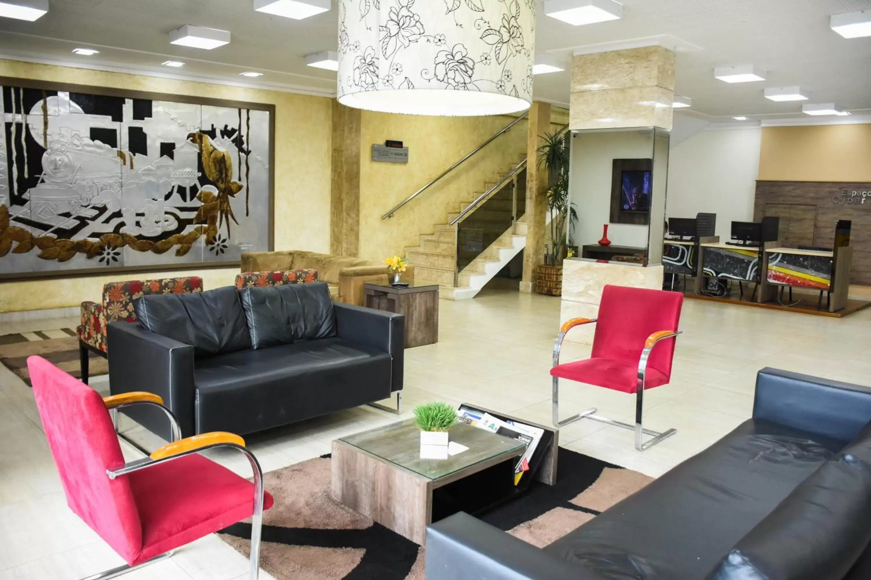 Living room in Larison Executive - by Easy Hotéis Living room in Larison Executive - by Easy Hotéis