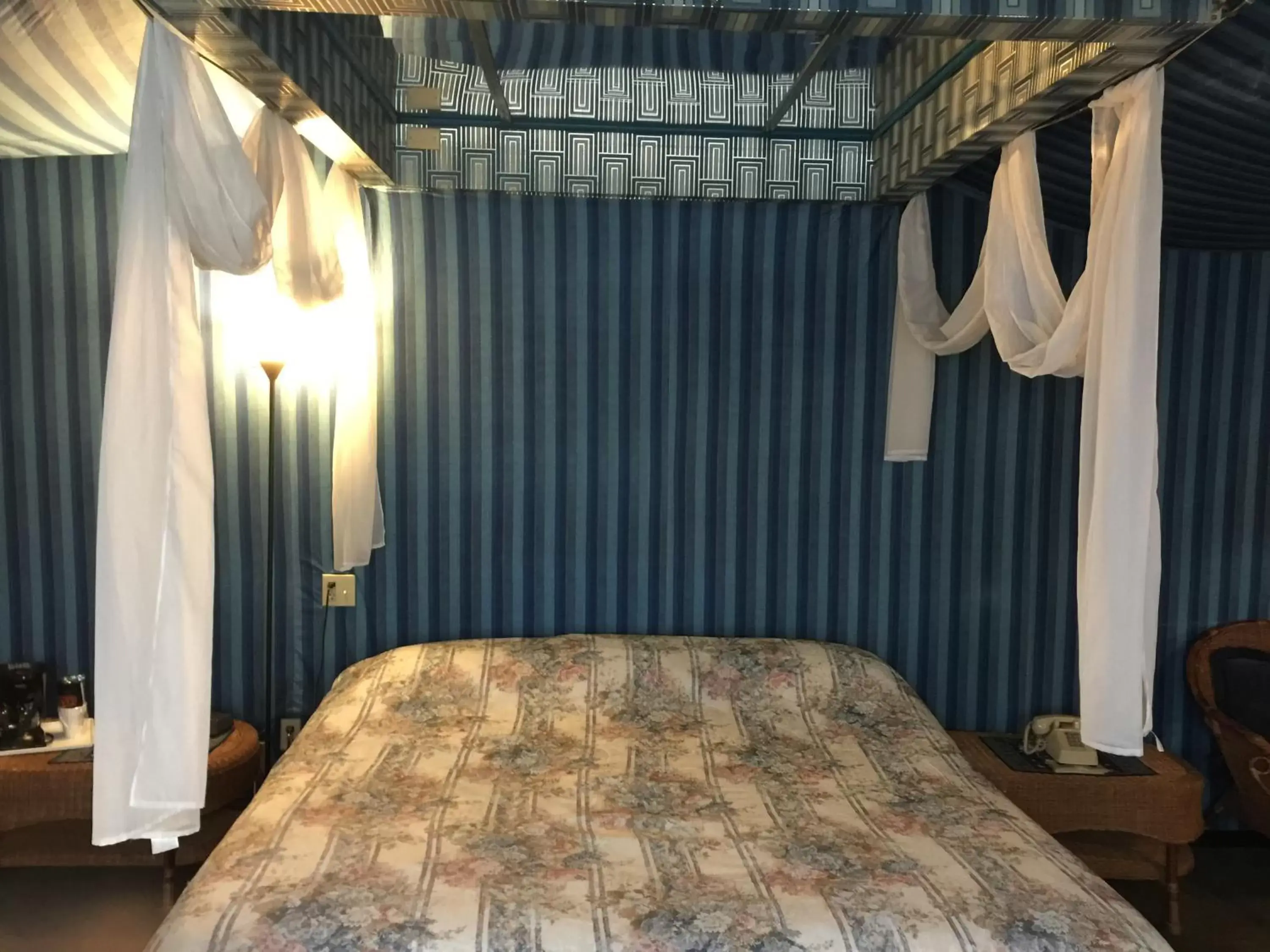 Bed in Don Q Inn