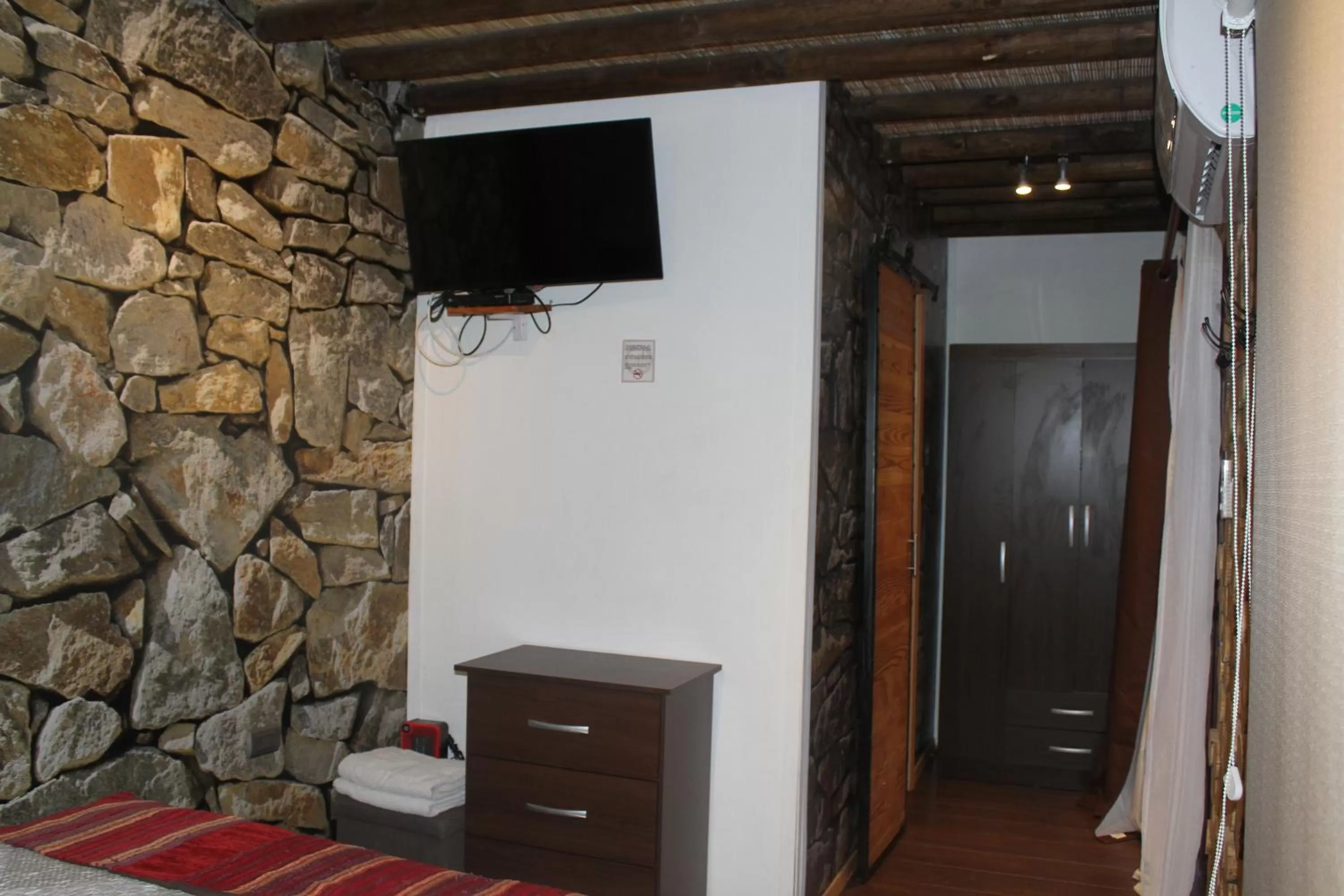 TV/Entertainment Center in Hotel Manada del Desierto