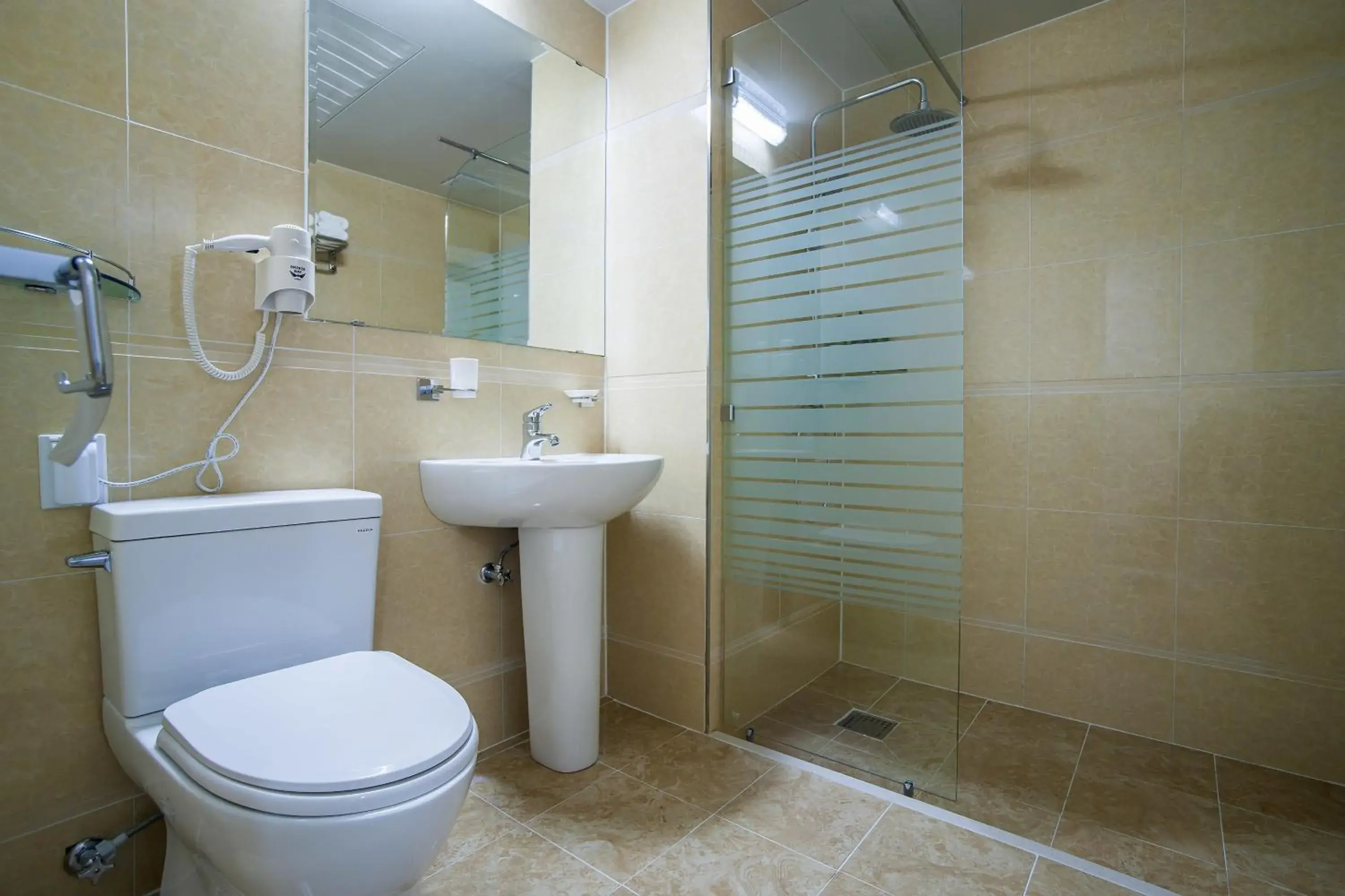 Toilet, Bathroom in Breeze Bay Hotel