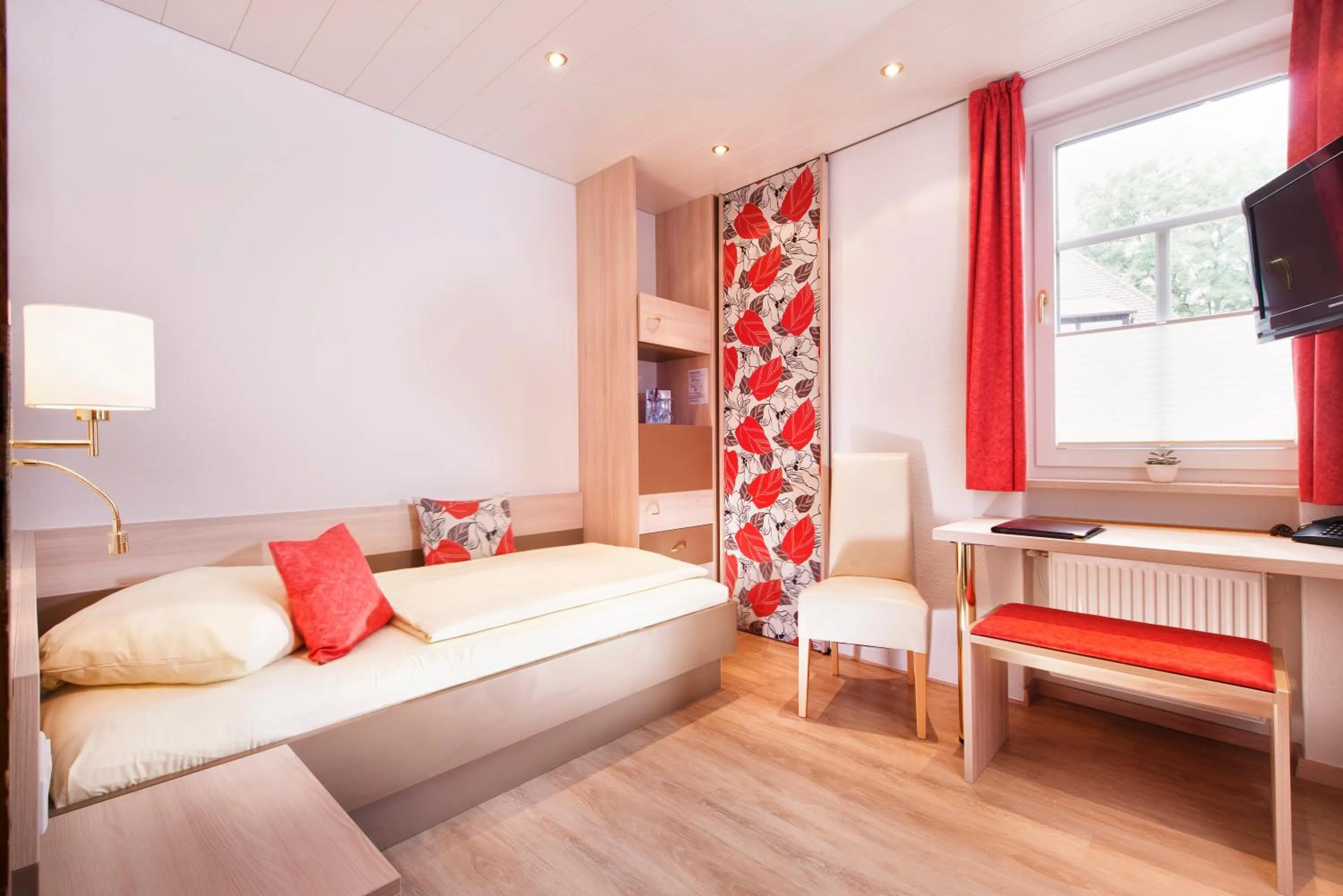 Bed in Hotel Goldenes Fass in Rothenburg ob der Tauber