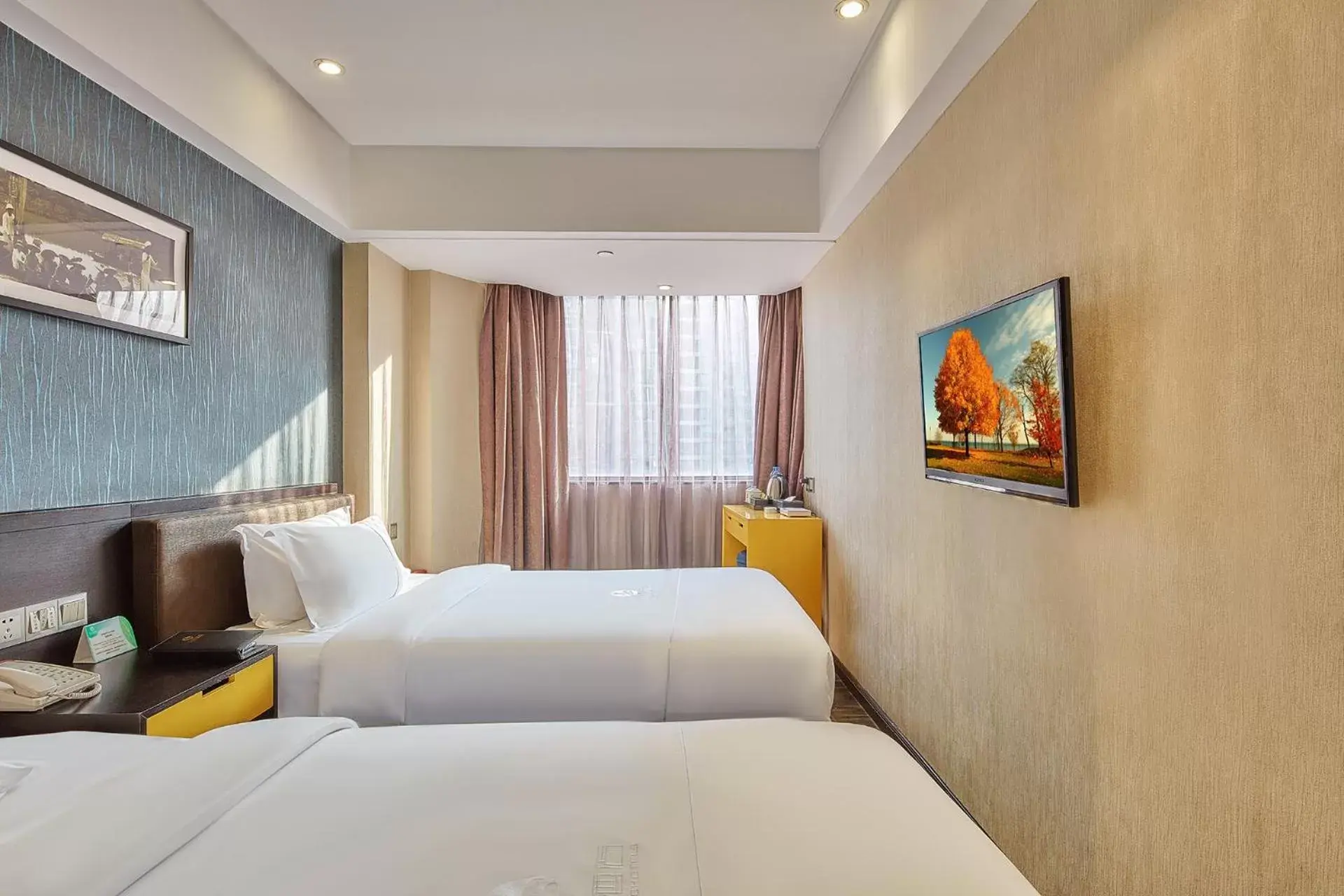 Bed in Insail Hotels ( Huanshi Road Taojin Metro Station Guangzhou)