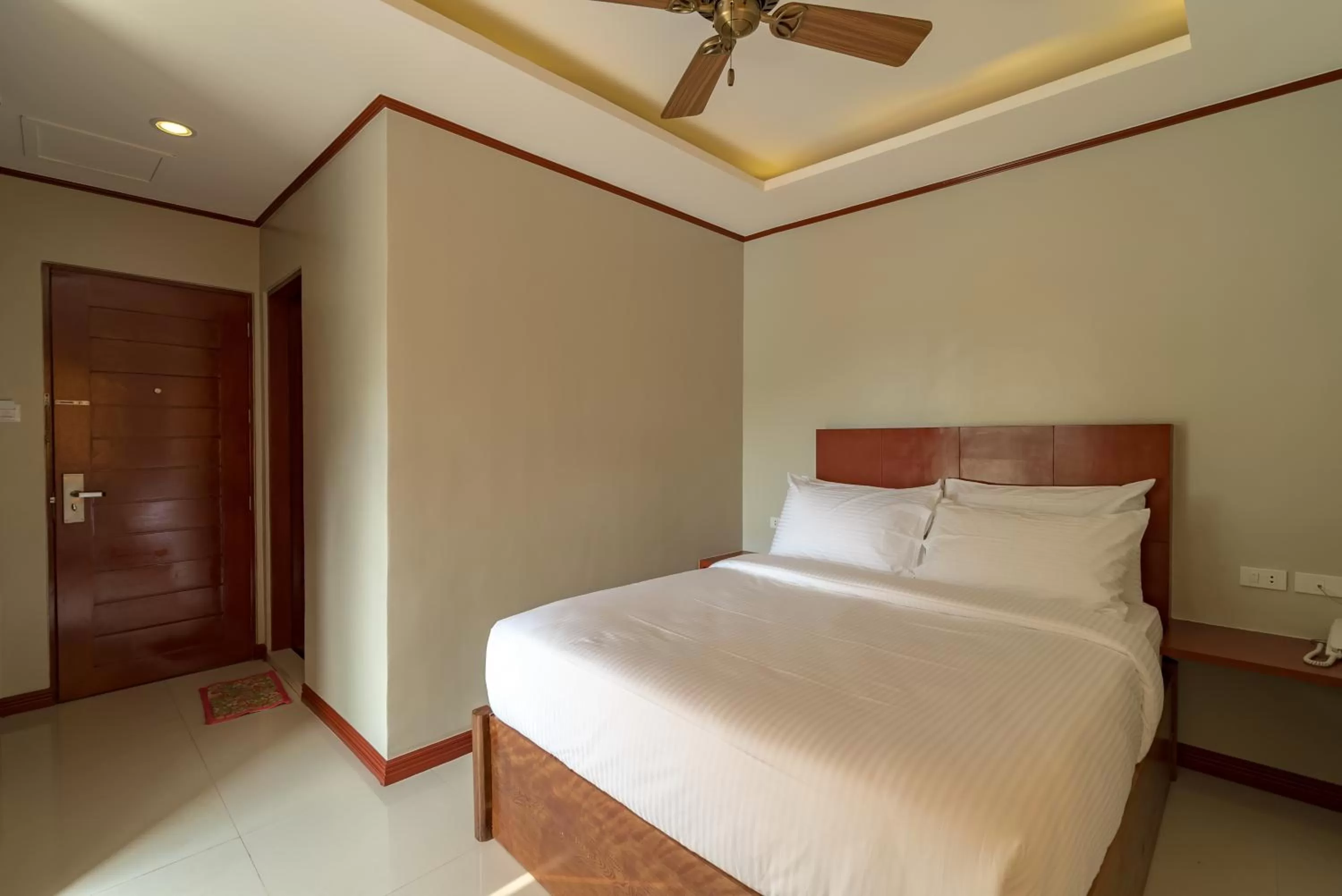 Bed in Coral Cliff Hotel