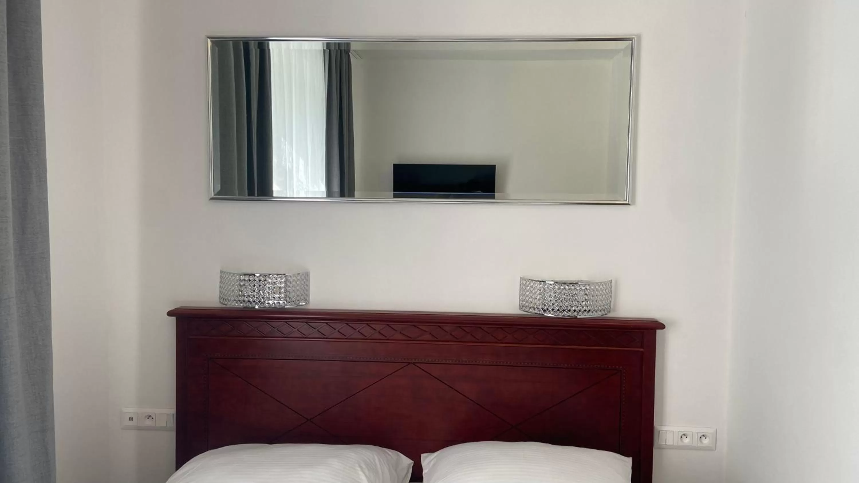 Bed in Aparthotel Slezák