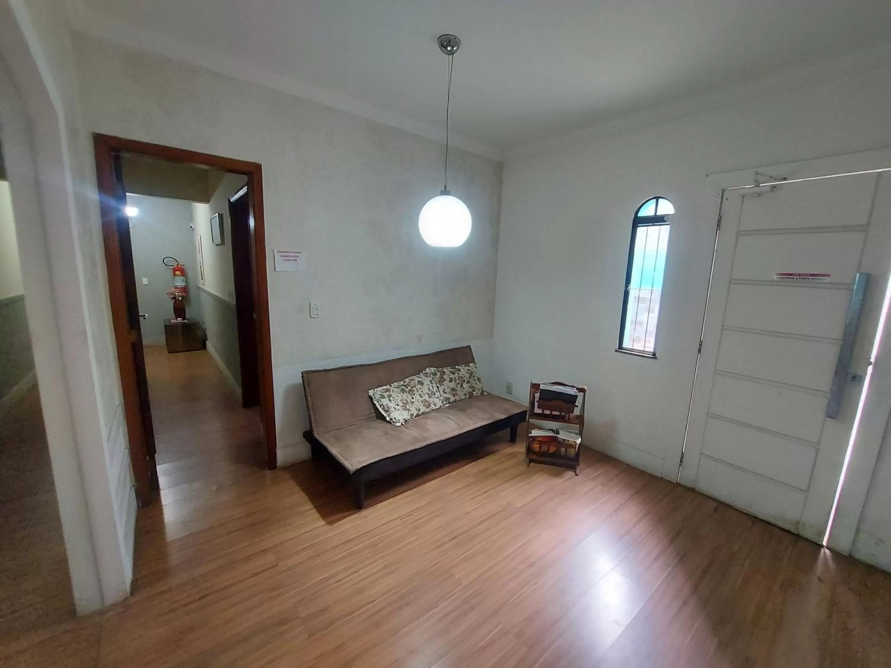 Seating area, Bed in Pousada Casa Familia