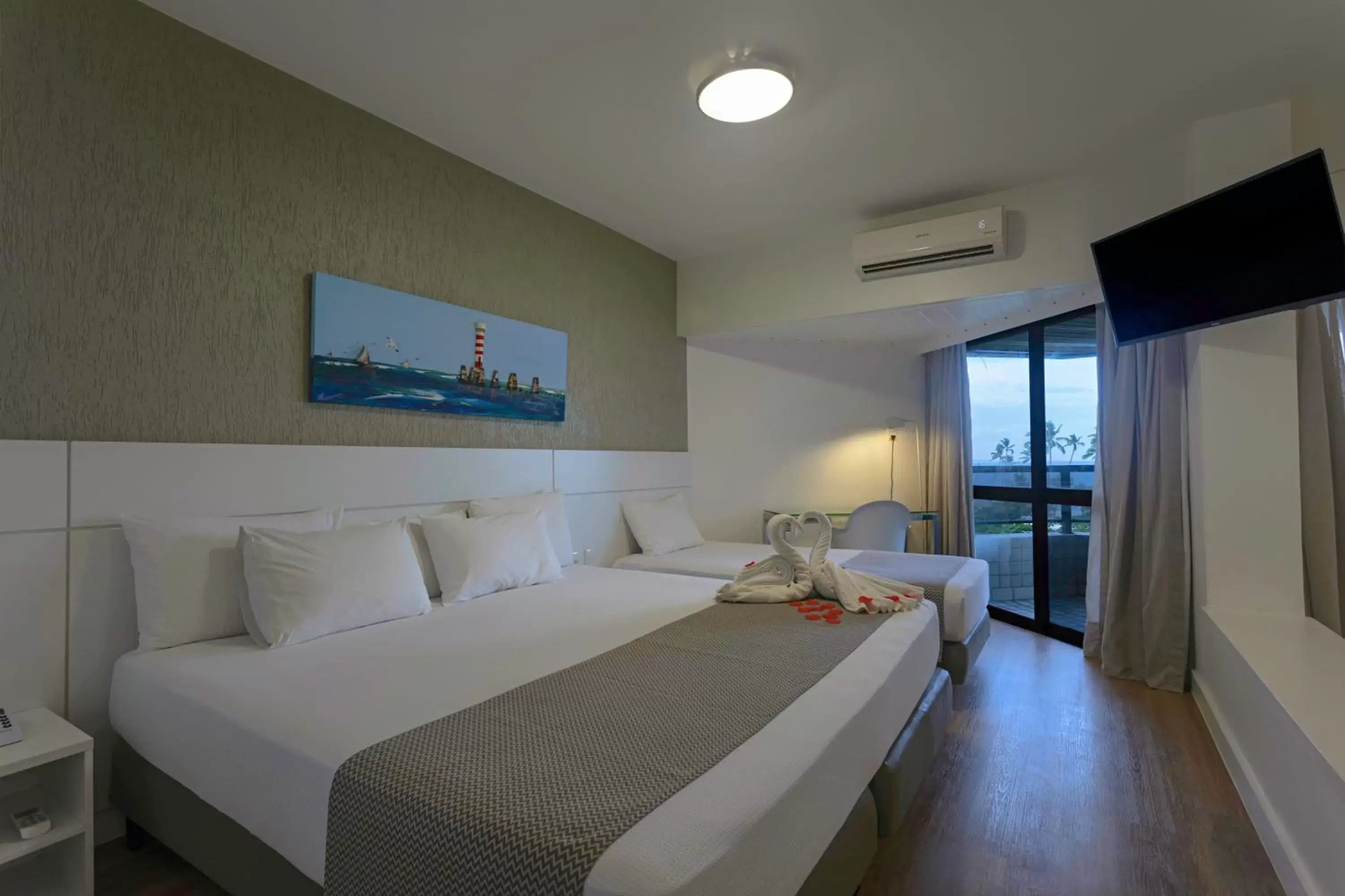 Photo of the whole room, Bed in Maceió Atlantic Suites Photo of the whole room, Bed in Maceió Atlantic Suites