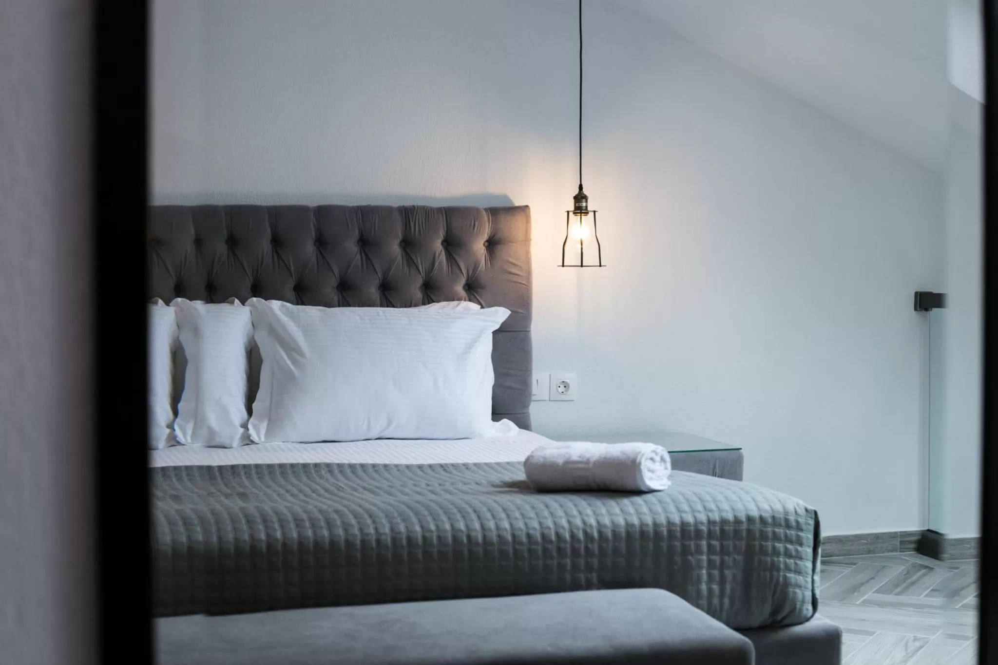 Bed in Anemos Luxury Apartments