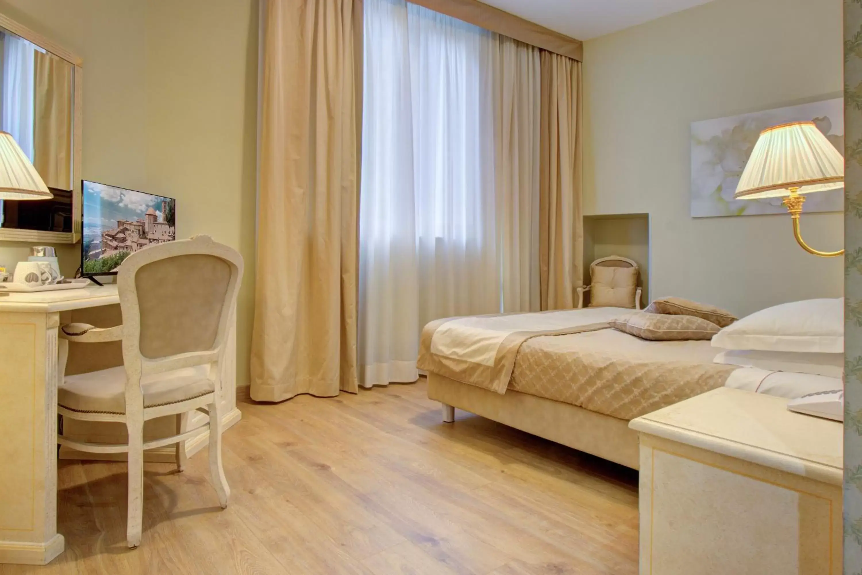 Bedroom in Hotel La Locanda