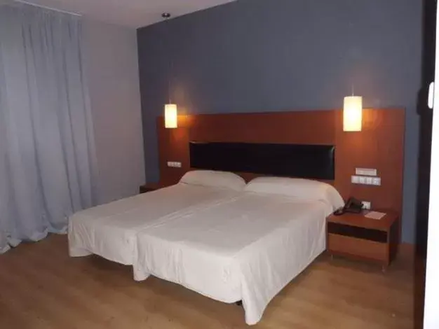 Bed in Hotel Romero Merida
