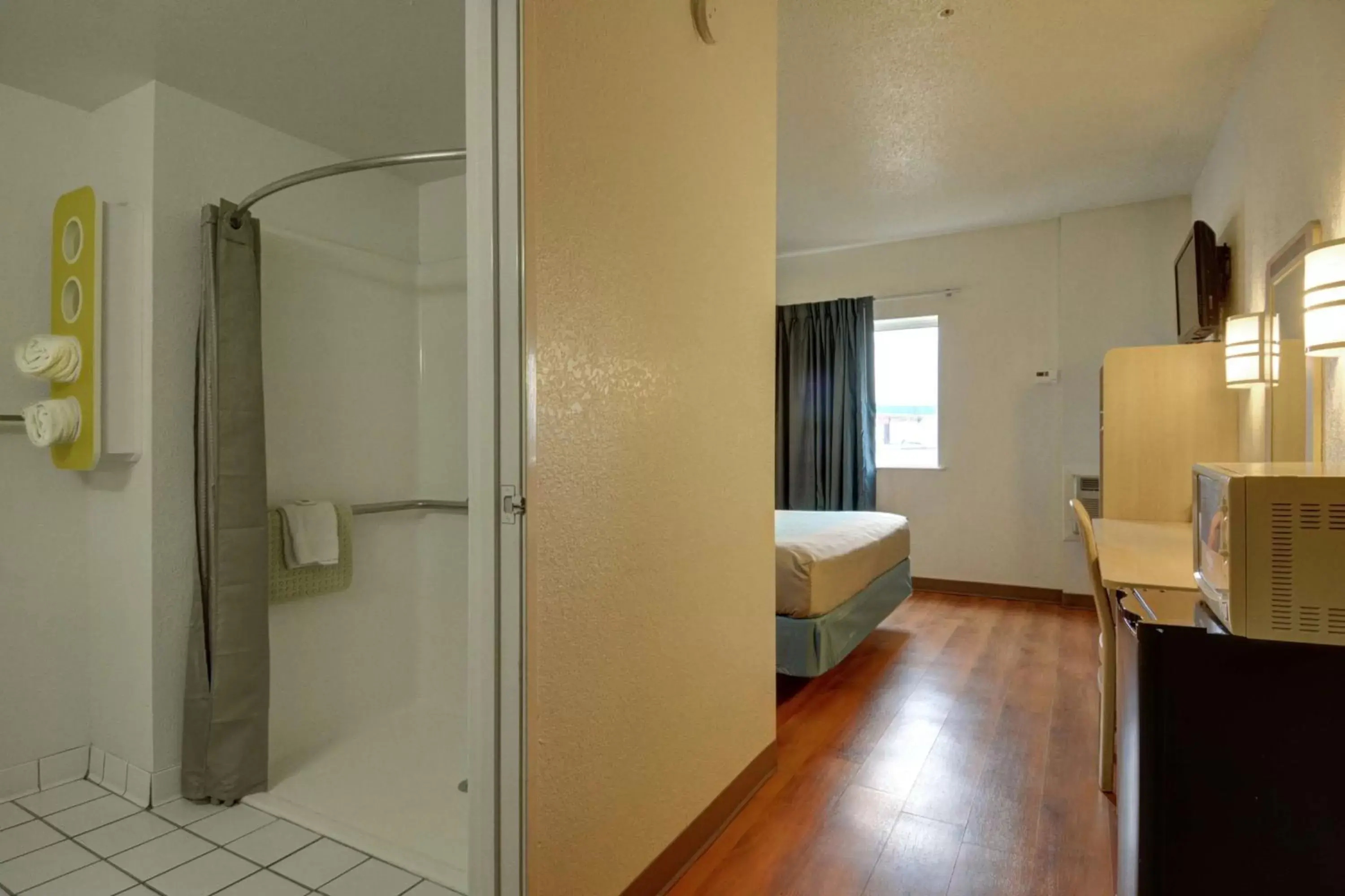 Photo of the whole room, Bathroom in Motel 6-Denison, TX