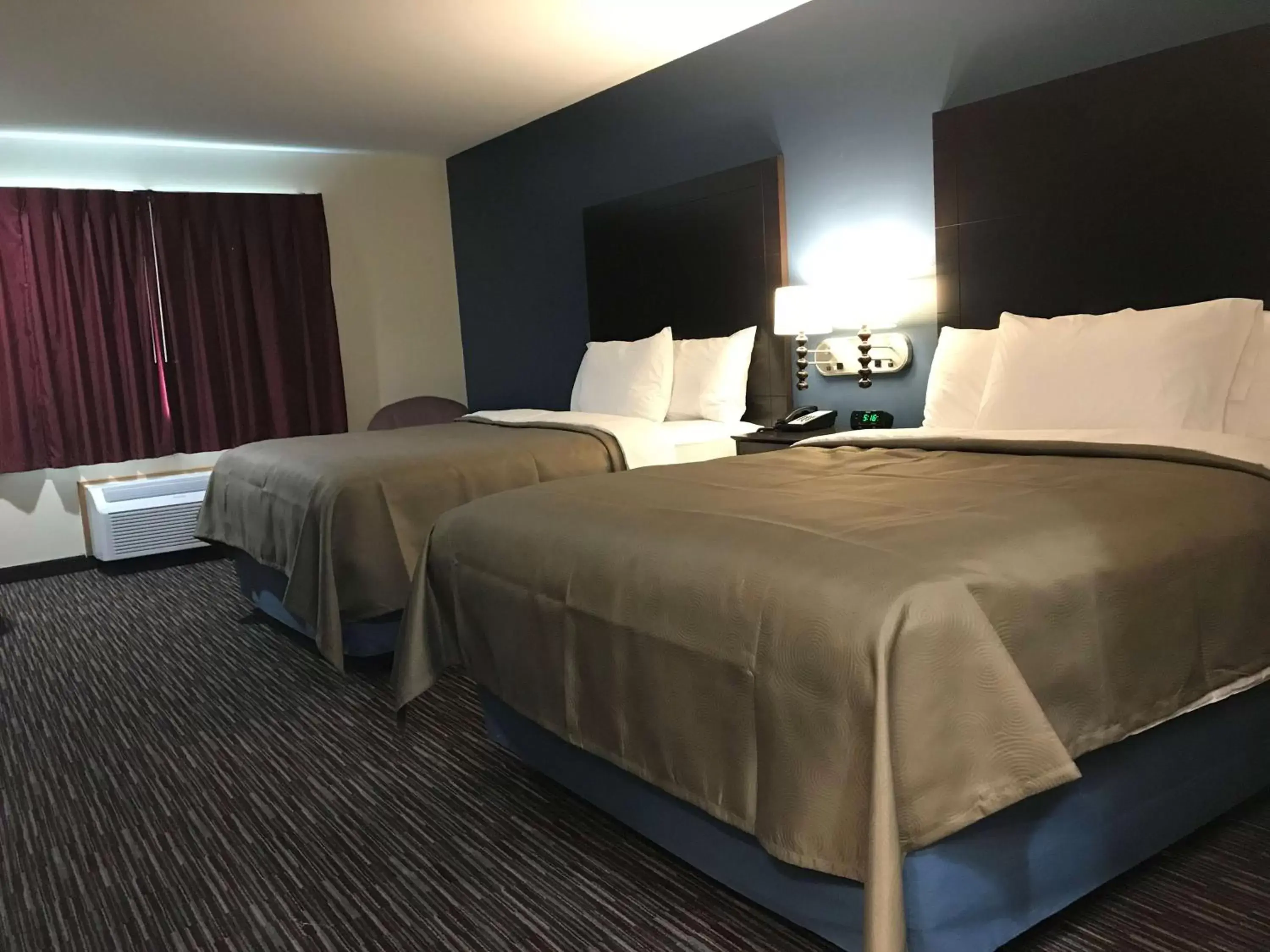 Deluxe Queen Room with Two Queen Beds - Non-Smoking in AmericInn by Wyndham Jefferson