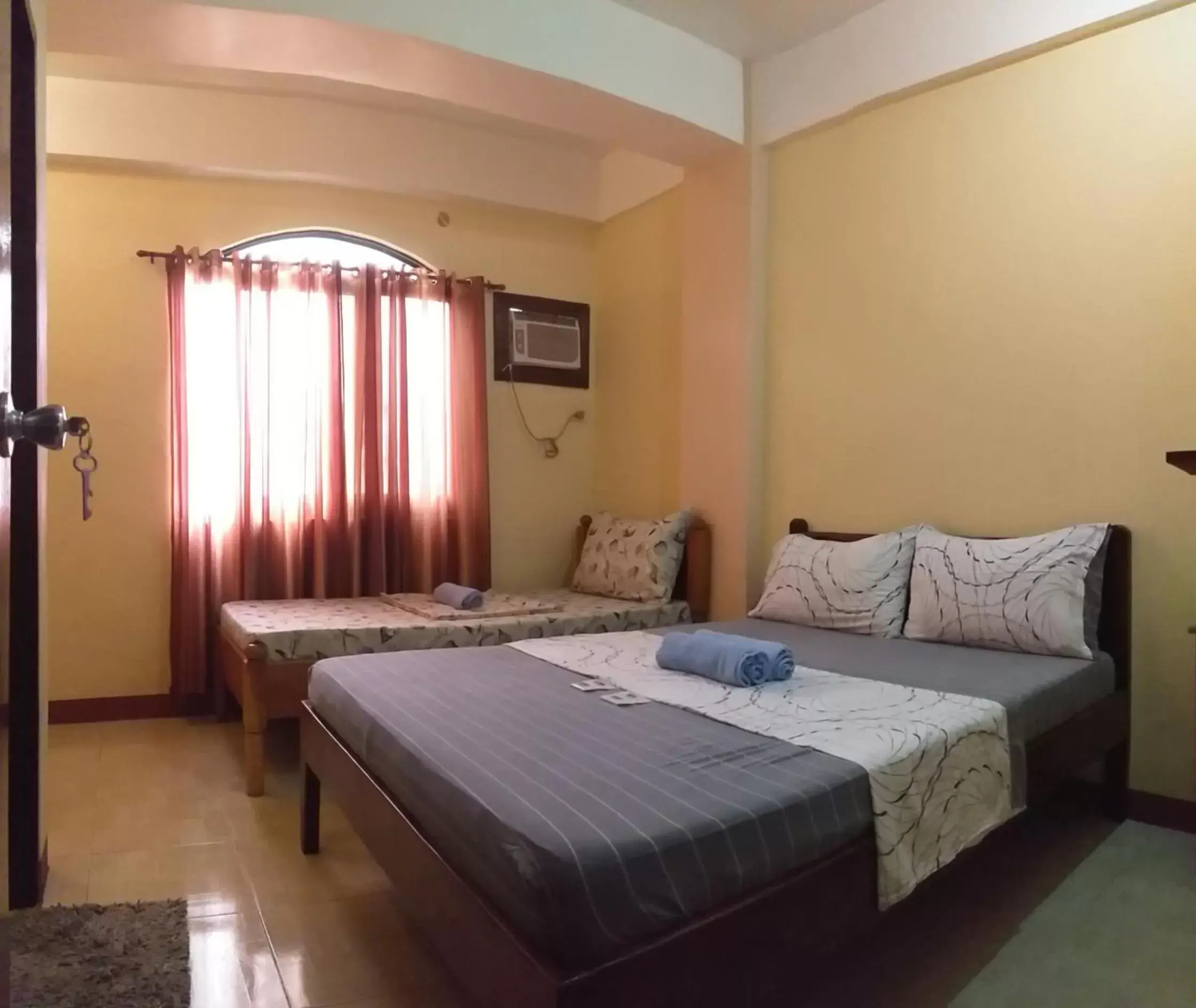 Standard Triple Room in Divine Castle Travelers Inn