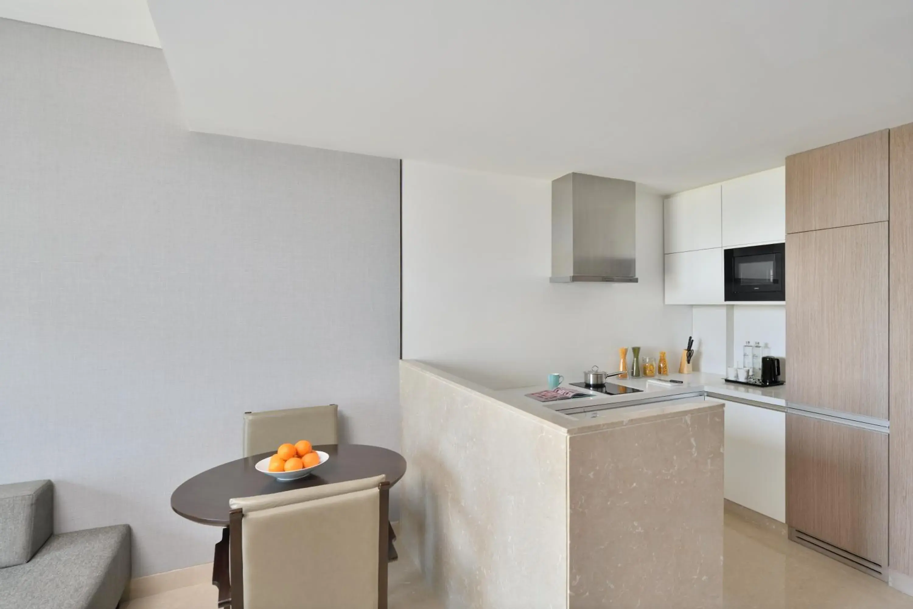 Living room, Kitchen/Kitchenette in Marriott Executive Apartments Navi Mumbai