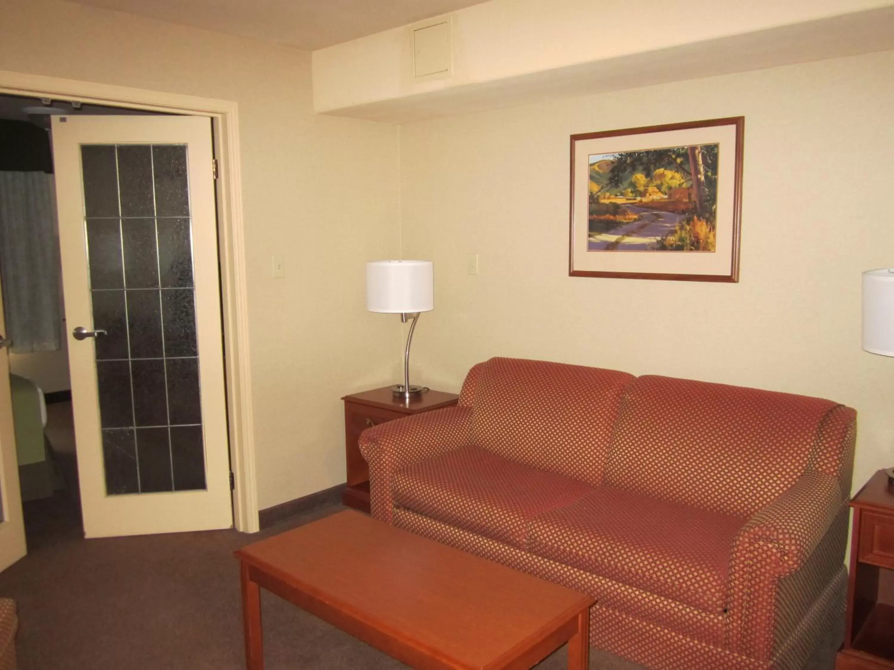 Seating area, Bed in Super 8 by Wyndham Fort St. John BC