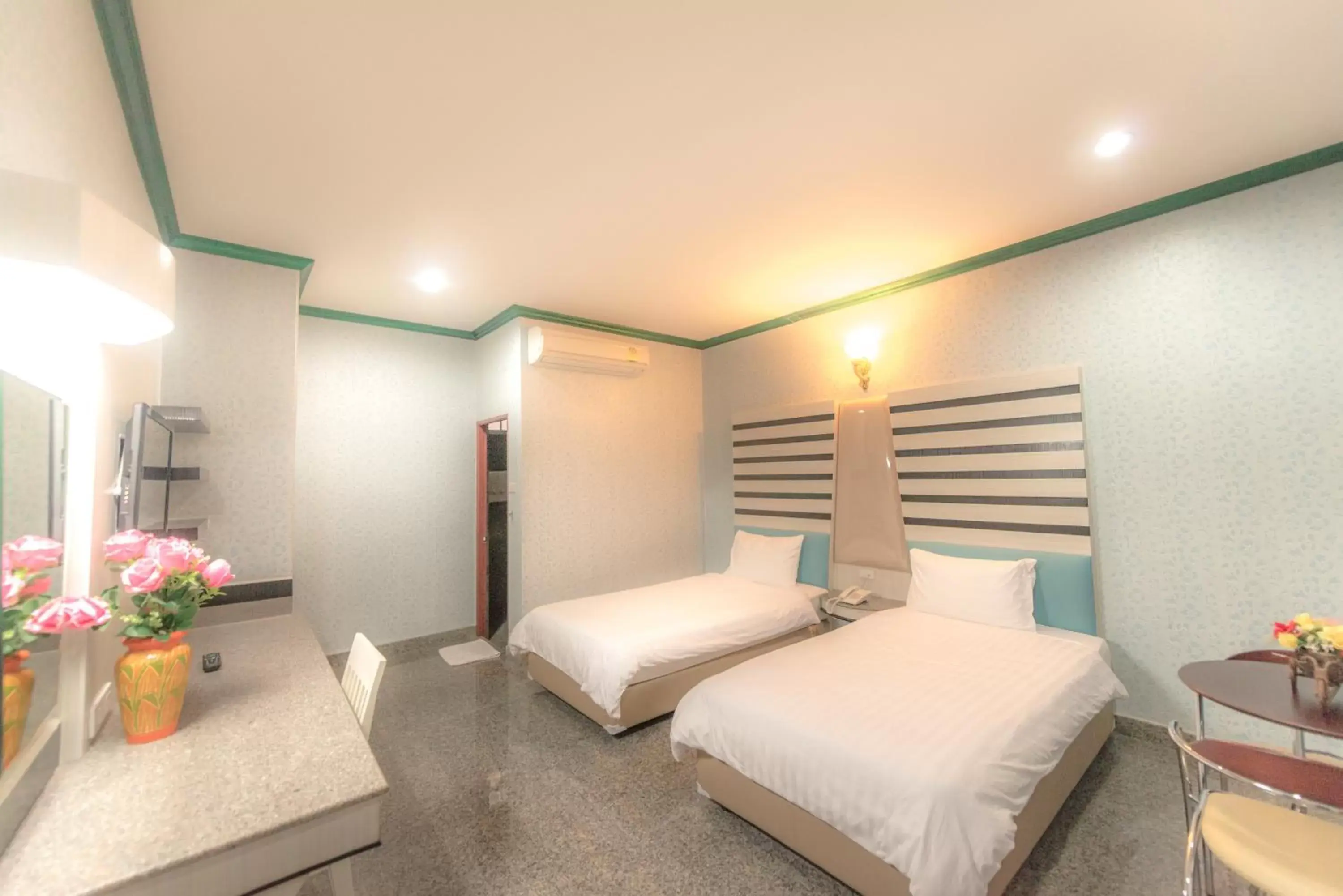 Bed in Martina Hotel Surin Bed in Martina Hotel Surin