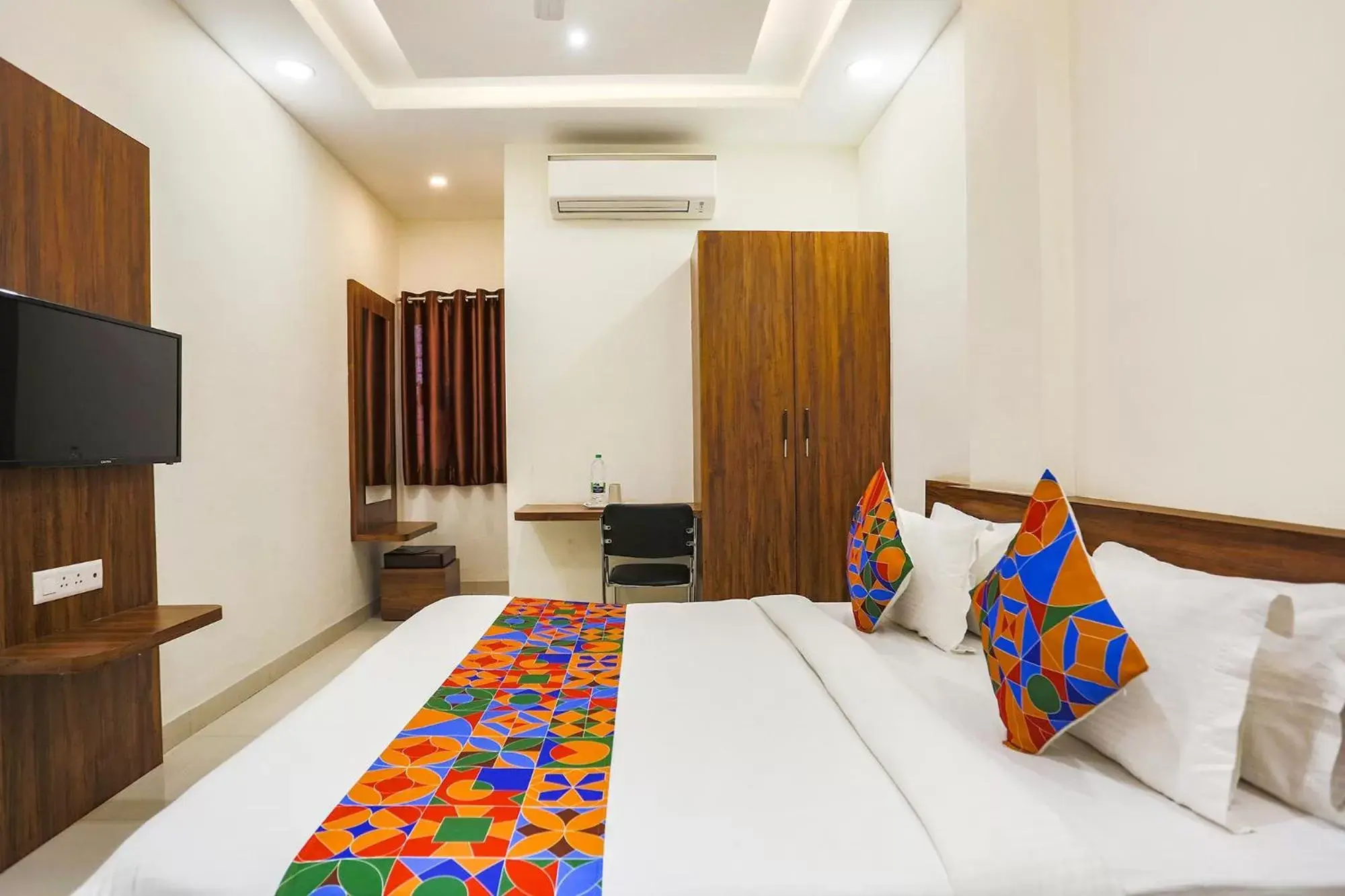 Bed in FabHotel Balaji Paradise Bed in FabHotel Balaji Paradise