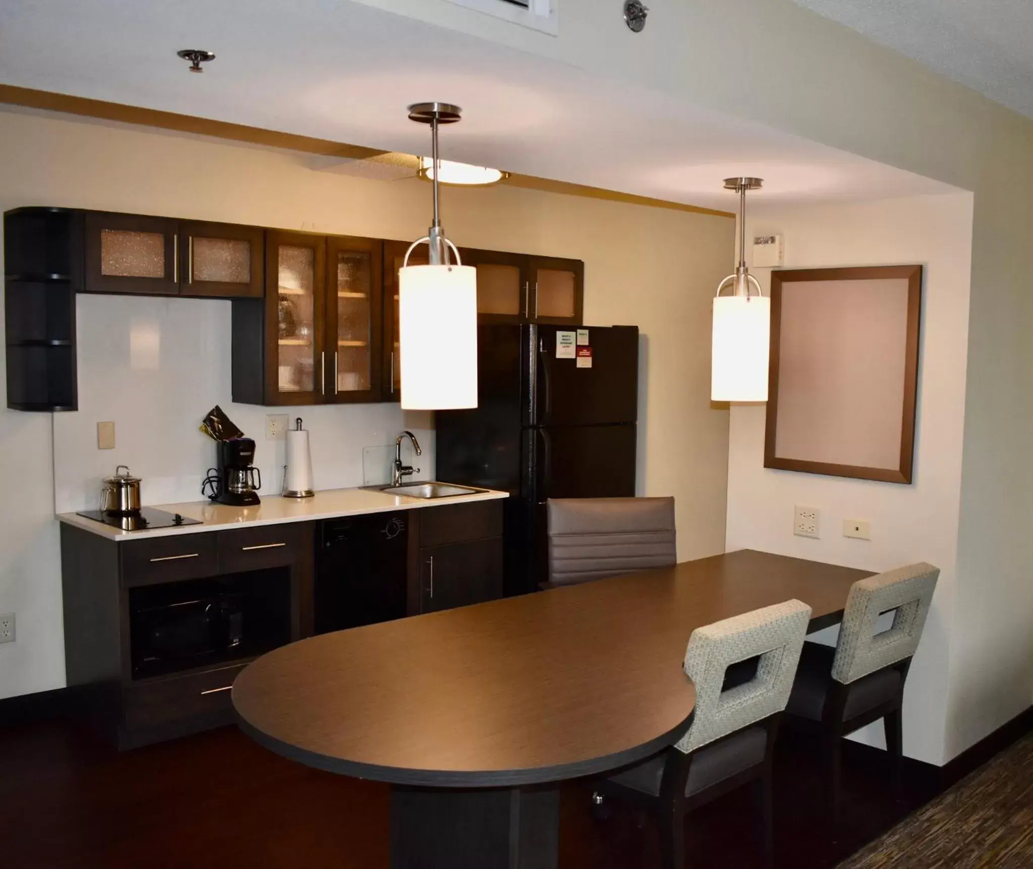 Photo of the whole room, Kitchen/Kitchenette in Candlewood Suites Indianapolis Downtown Medical District, an IHG Hotel