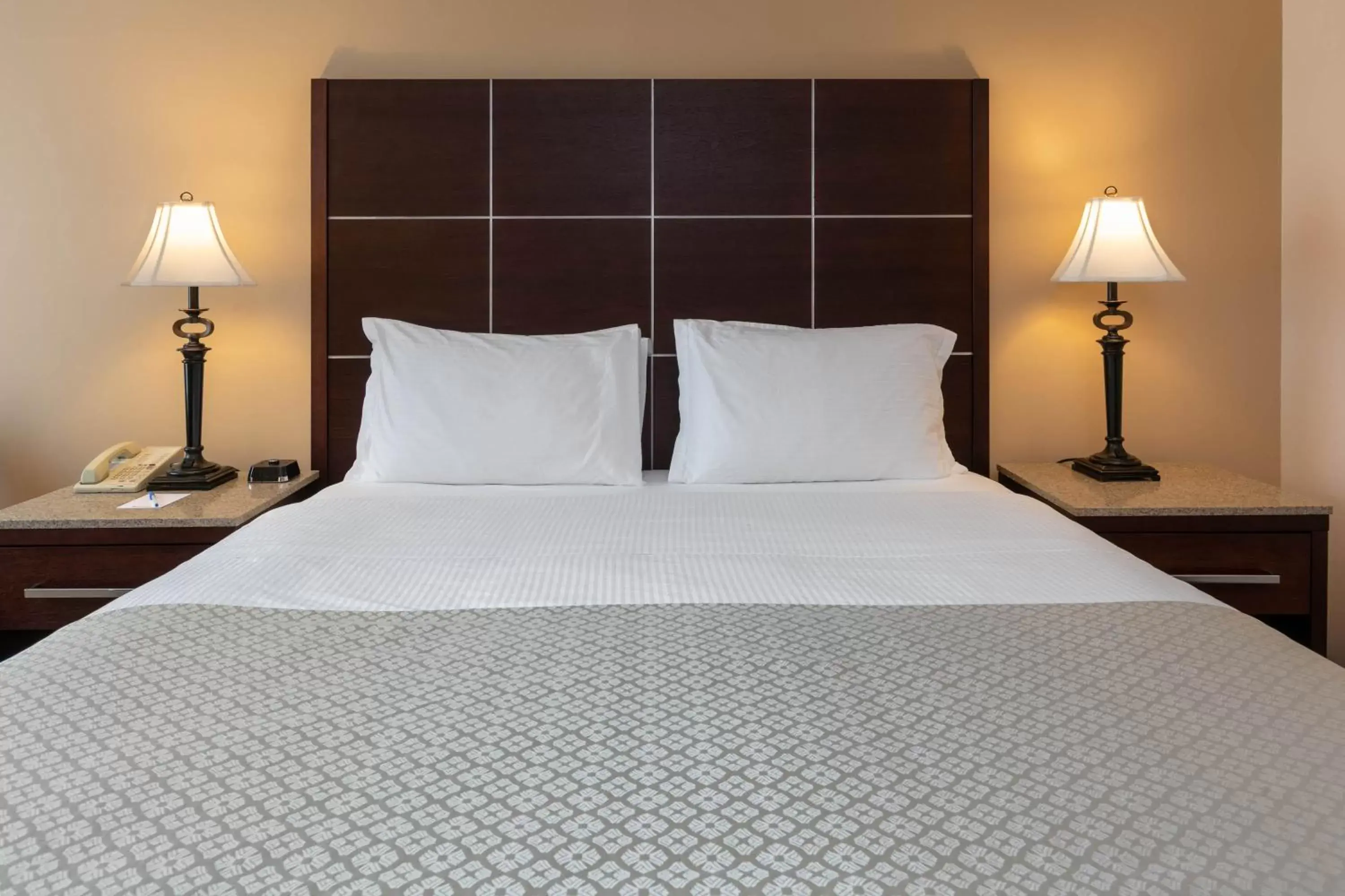 Bed in Wyndham Riverfront Hotel