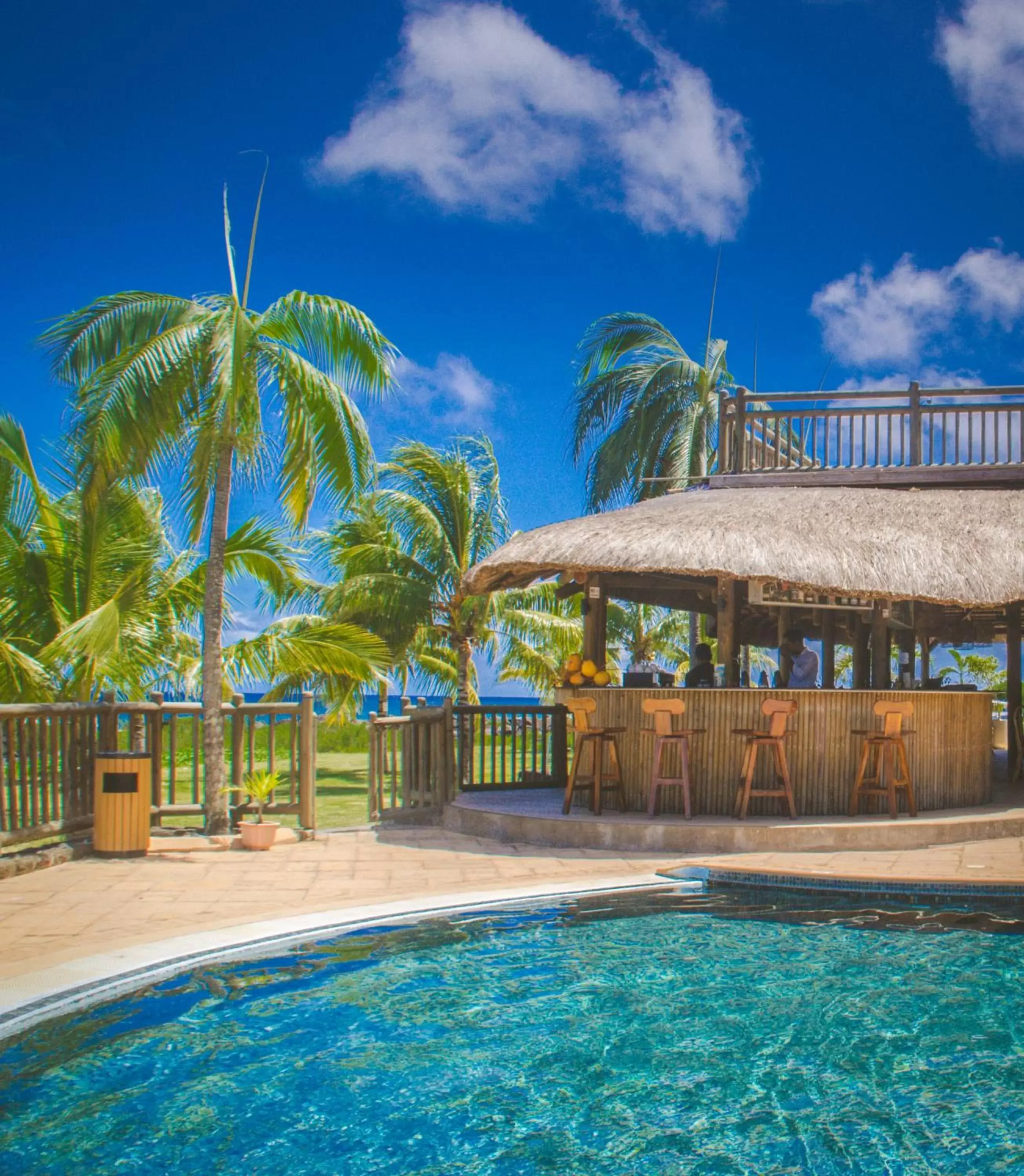 Lounge or bar, Swimming Pool in Sunset Reef Resort & Spa