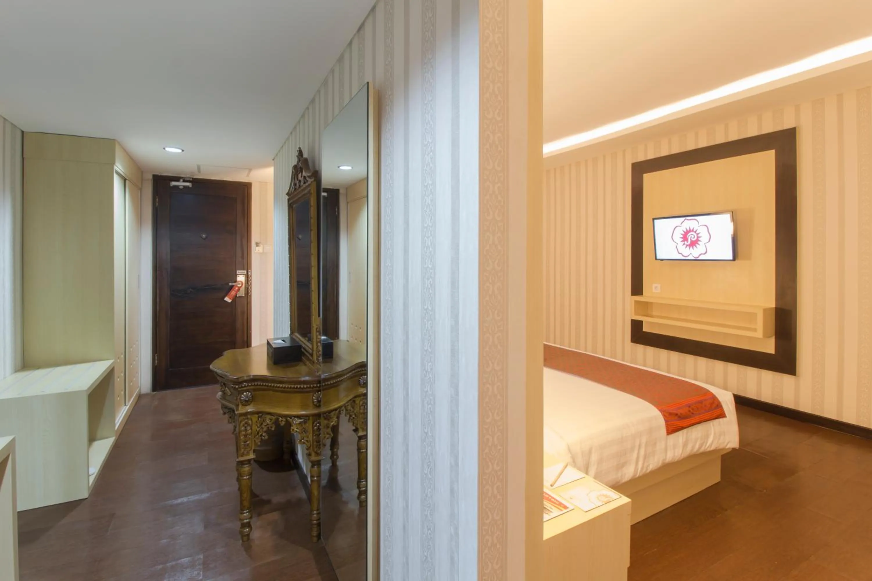 Bed in Grand Puri Saron Hotel Yogyakarta