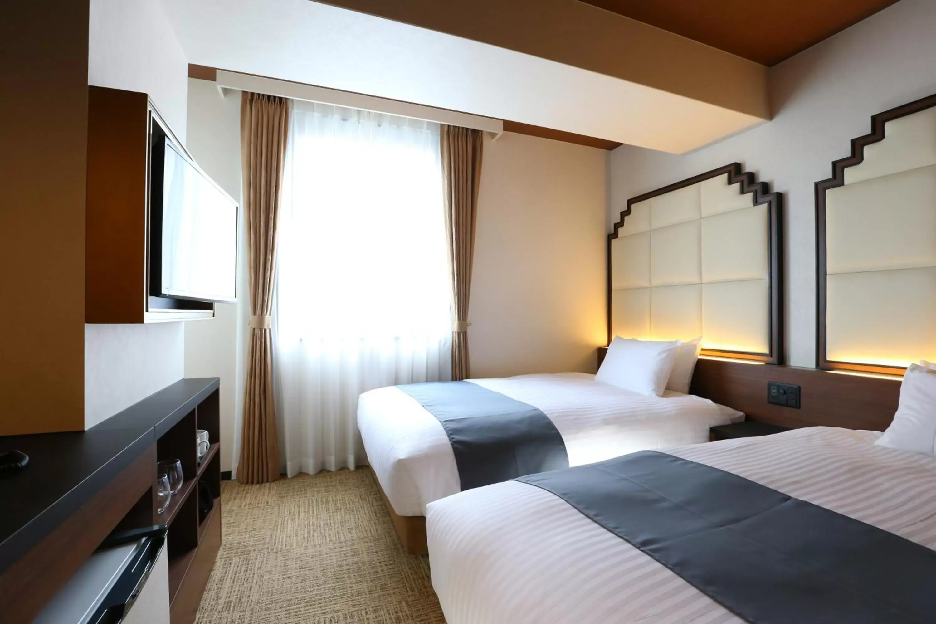 Bed in Hotel Wing International Select Osaka Umeda