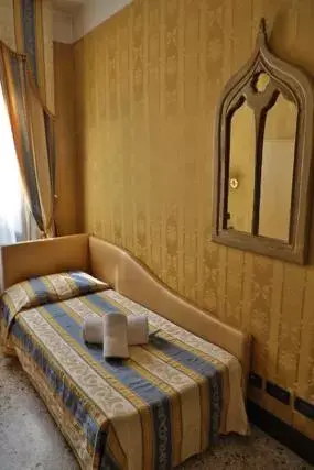 Bed in Hotel Noemi