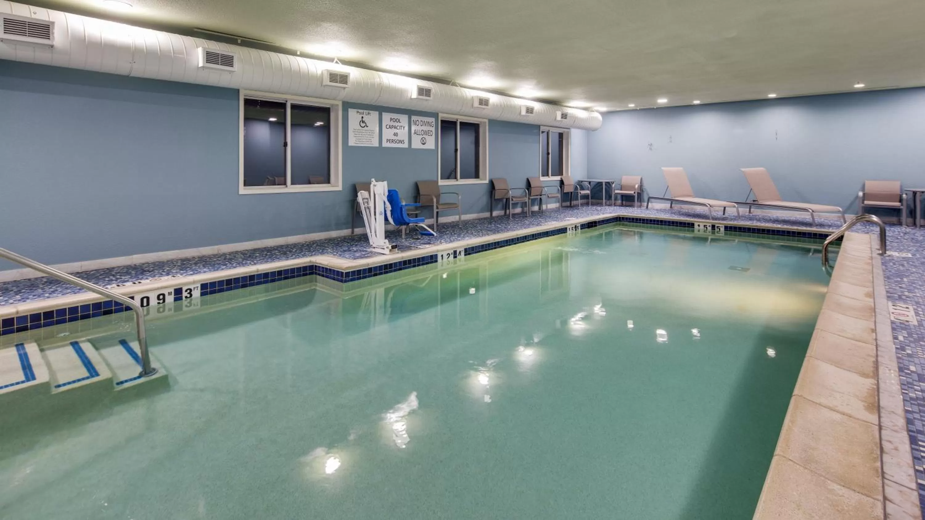 Swimming pool in Holiday Inn Express & Suites Detroit - Farmington Hills by IHG