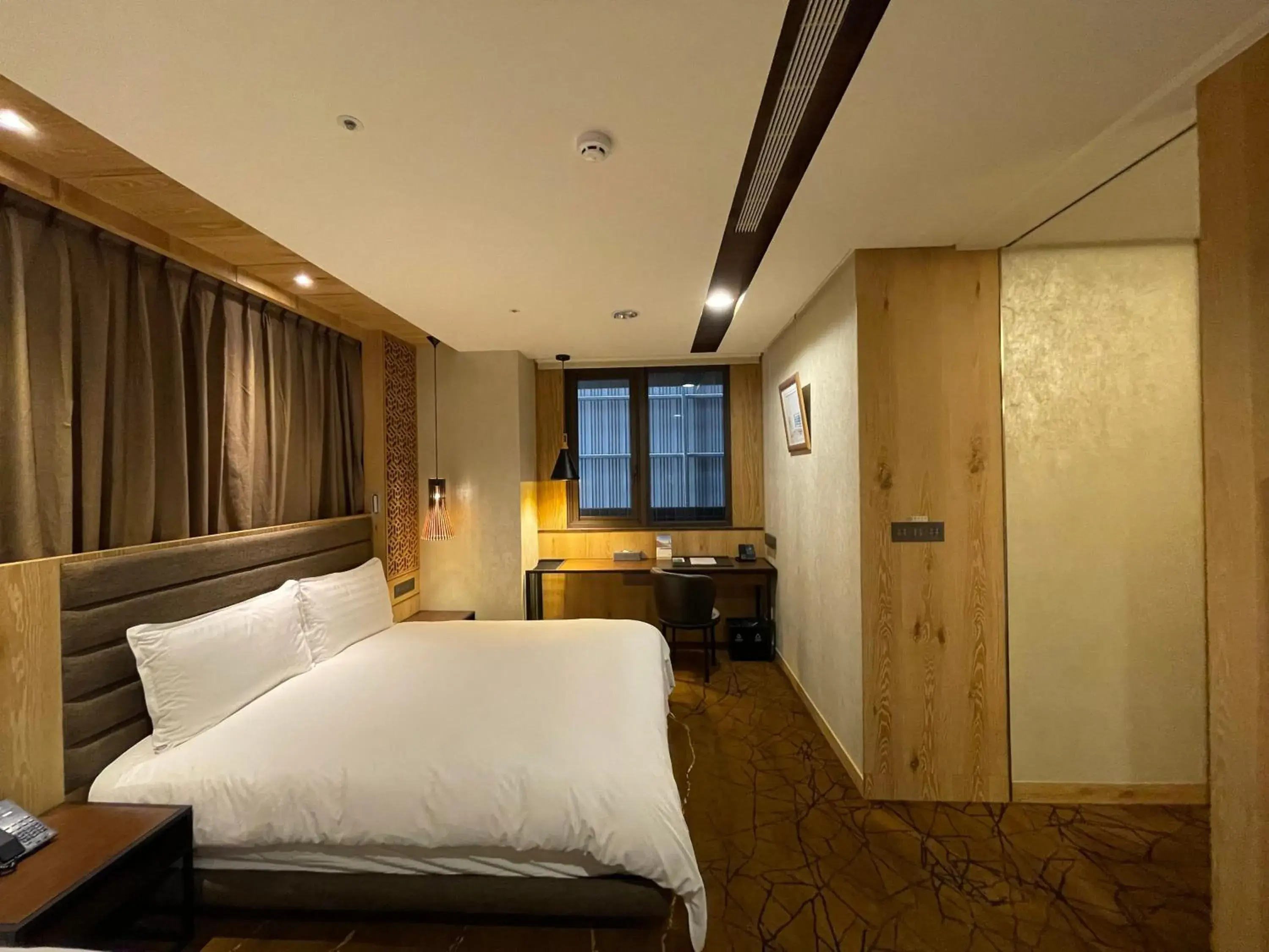 Bed in Hotel Chateau Anping
