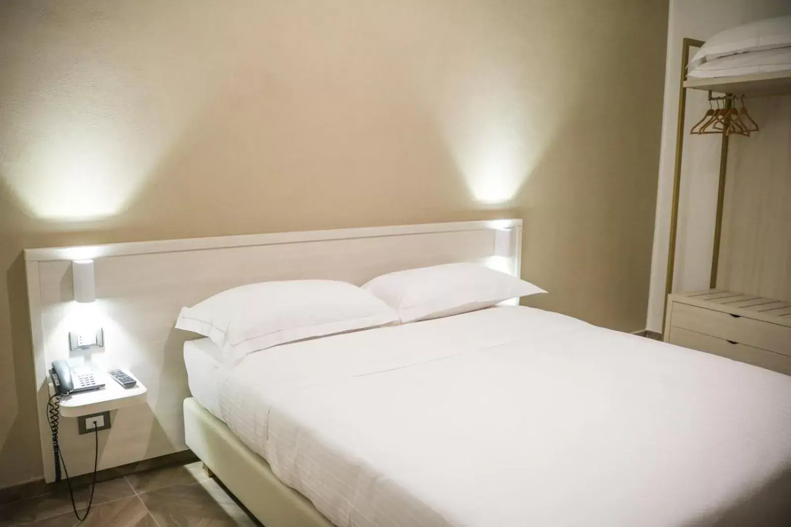 Bed in Hotel Donatello