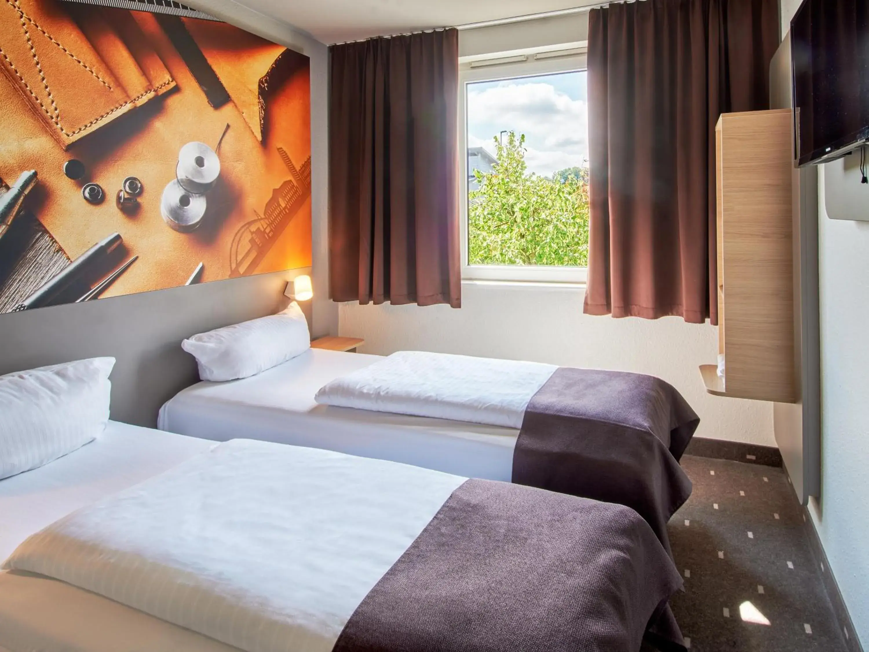 Bed in B&B Hotel Offenbach-Süd Bed in B&B Hotel Offenbach-Süd