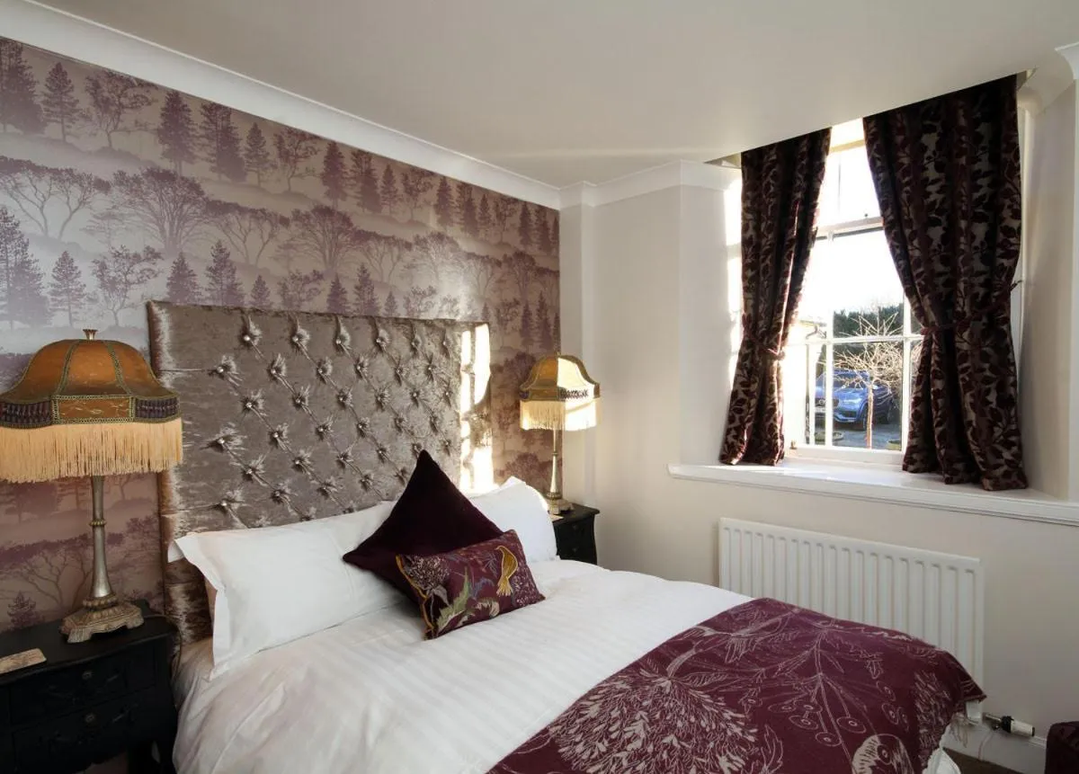 Bed in The Horseshoe Inn