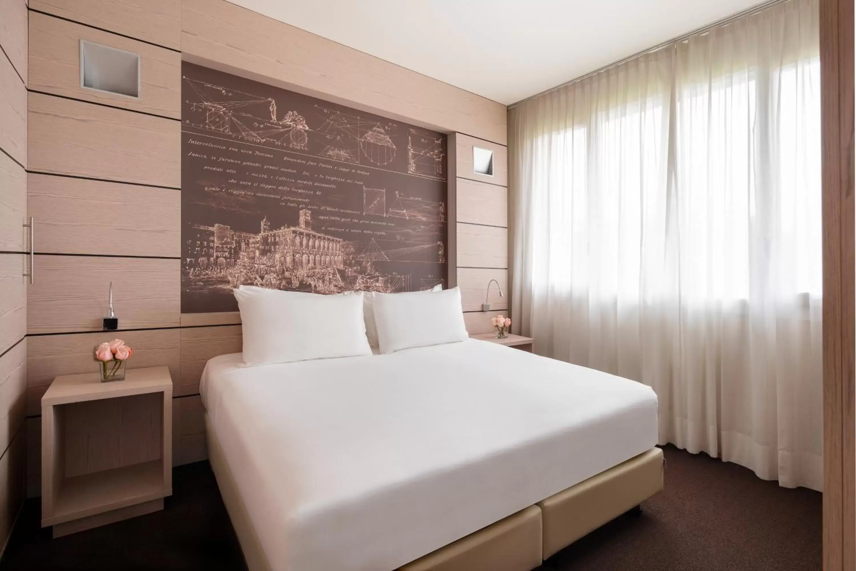 Bed in UNAHOTELS Bologna San Lazzaro