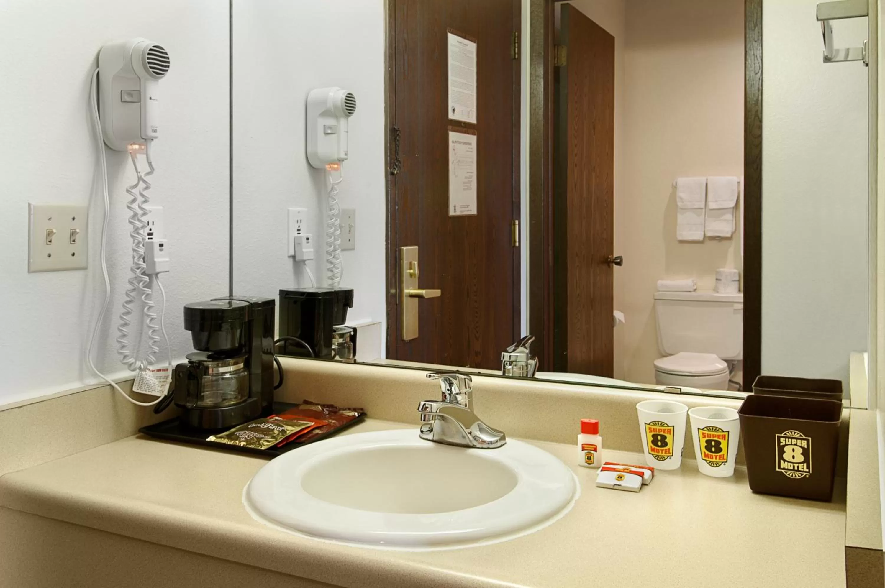 Bathroom in Super 8 by Wyndham Tomah Wisconsin