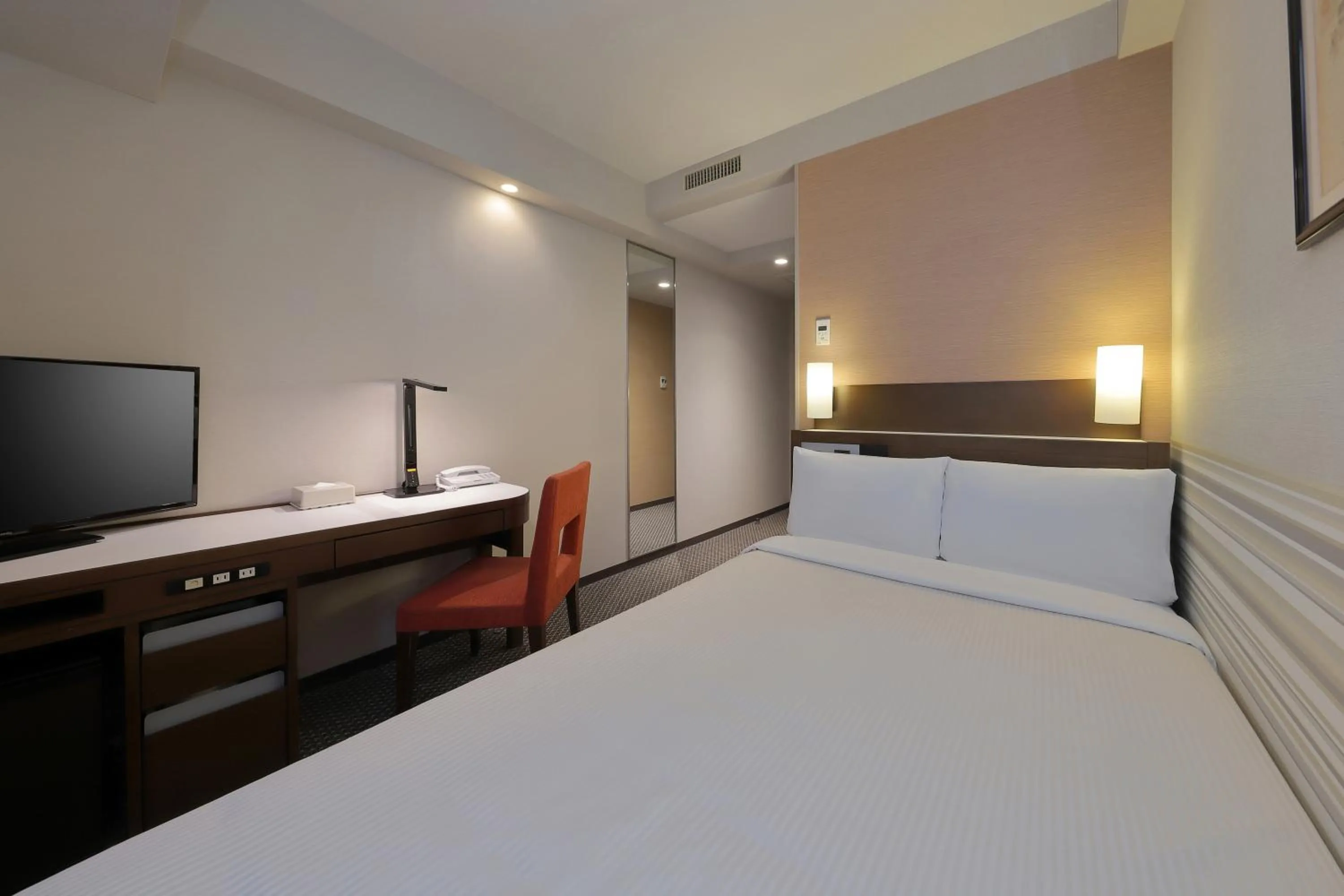 Bed in Keio Presso Inn Shinjuku