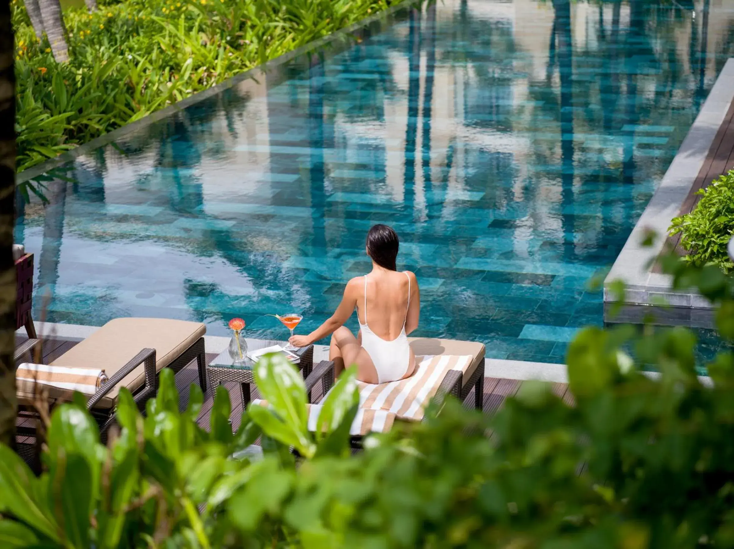 People, Swimming Pool in InterContinental Phu Quoc Long Beach Resort, an IHG Hotel