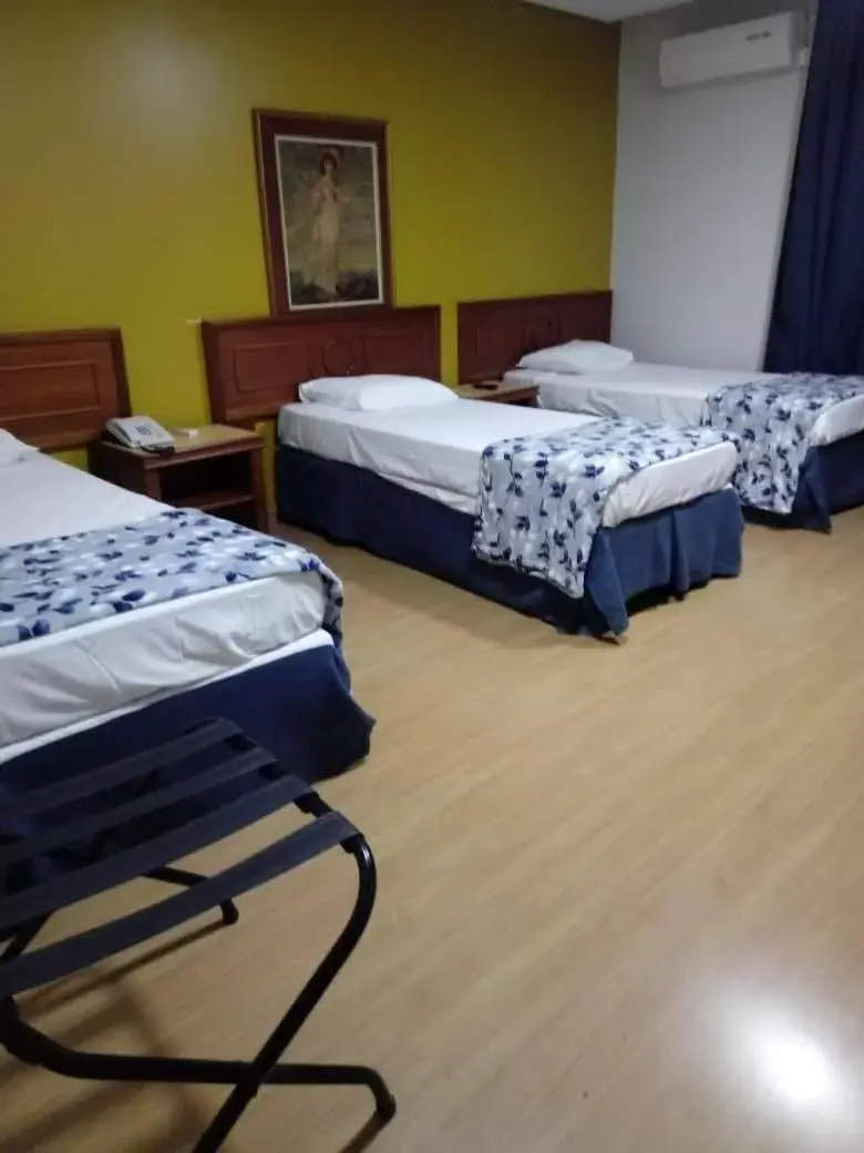 Photo of the whole room, Bed in Embaixador Hotel e Centro de Eventos