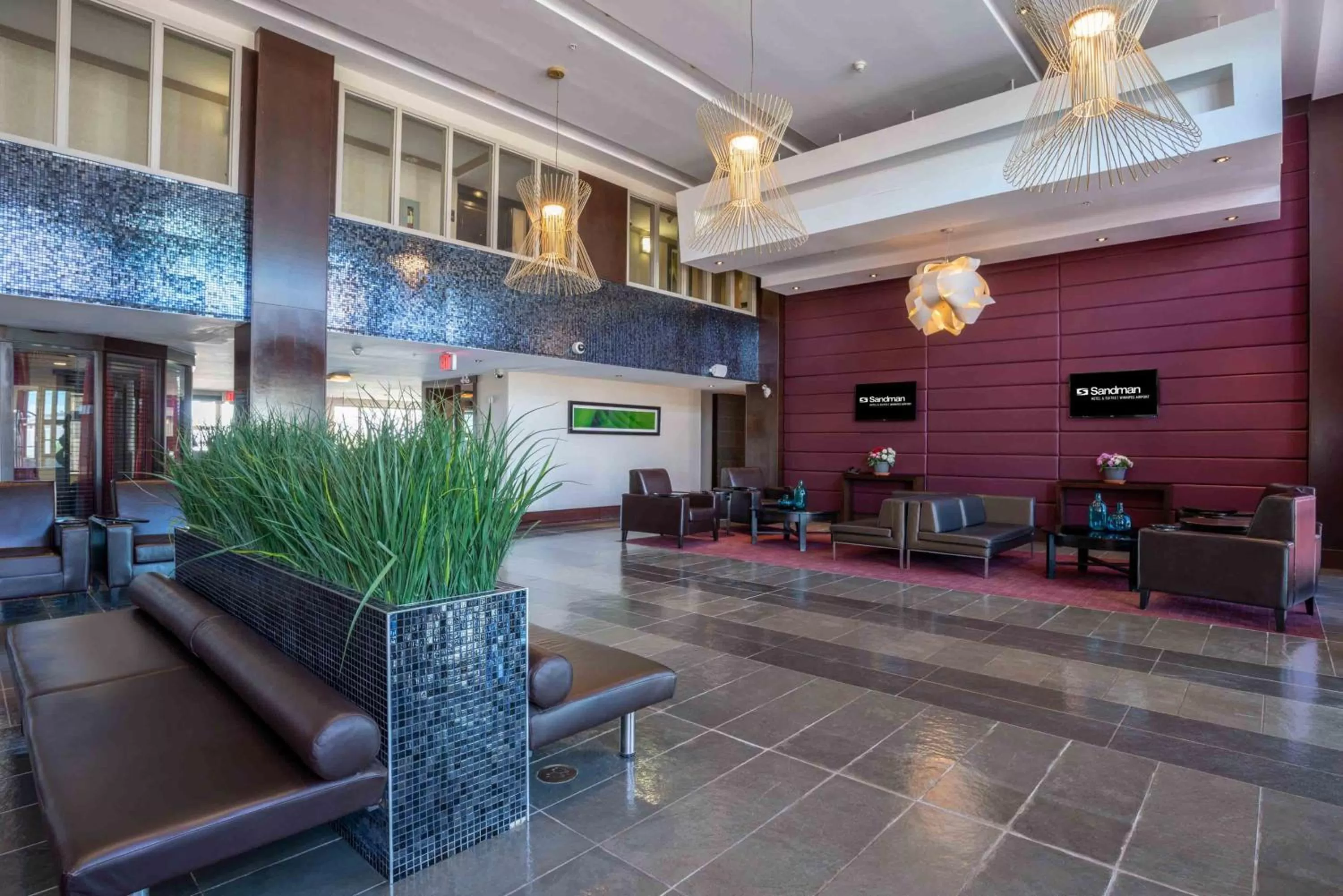 Lobby or reception in Sandman Hotel & Suites Winnipeg Airport